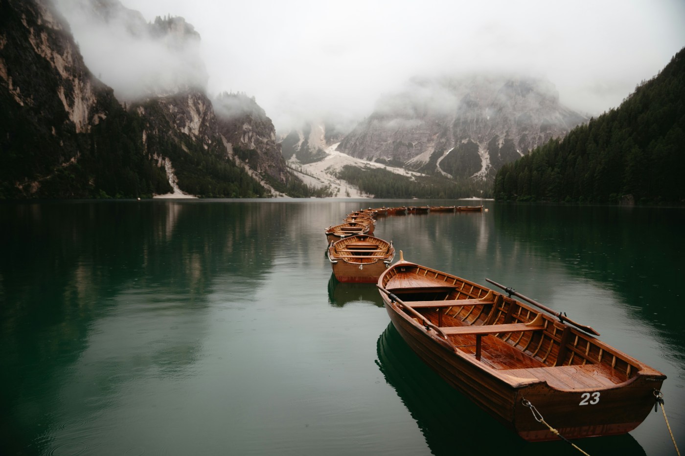 Dolomites lake and boats