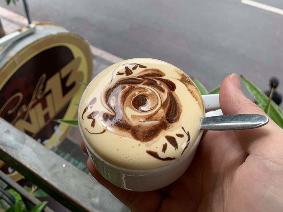 Beautiful cafe in Hanoi with Vietnamese coffee
