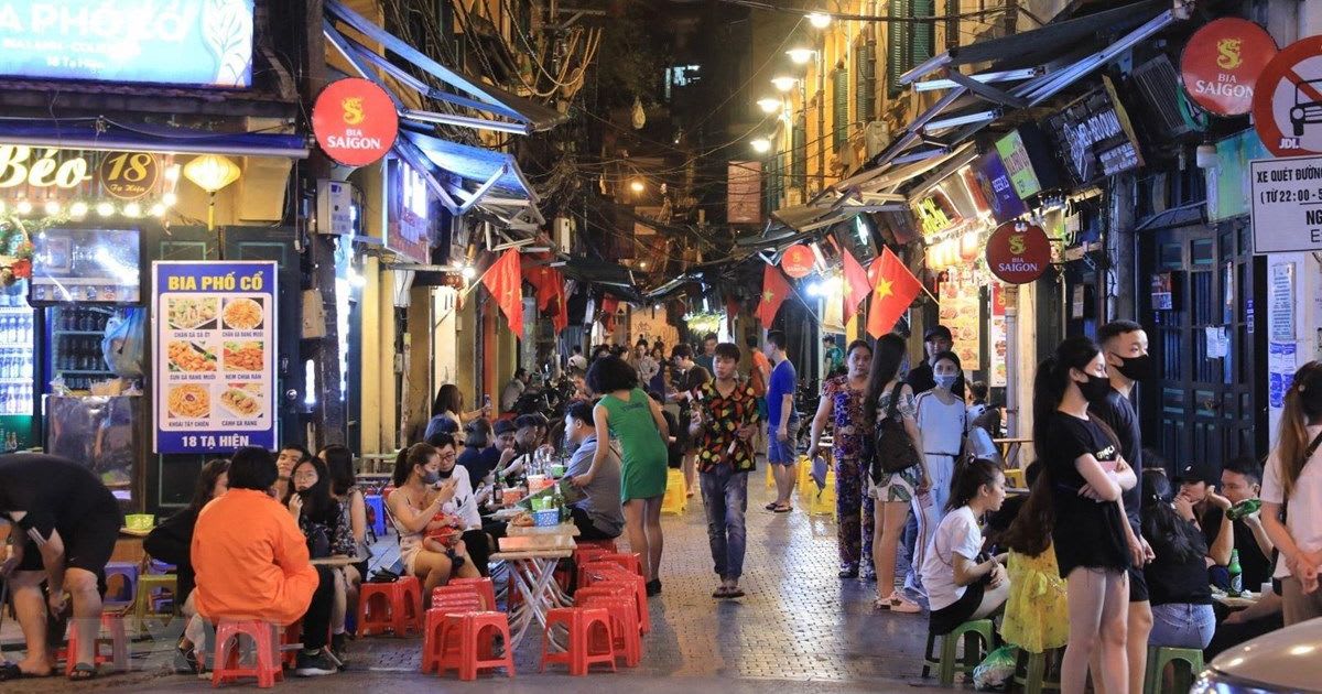 Vibrant nightlife scene on Tạ Hiện Street in Hanoi's Old Quarter
