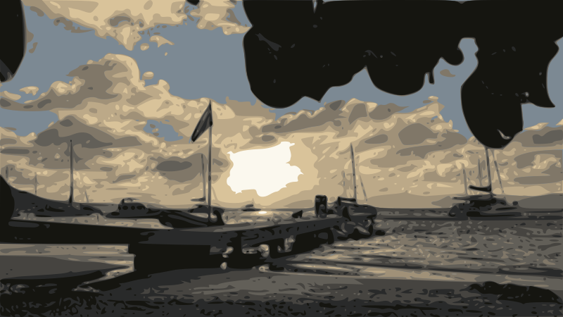 Picture of beach and boats at sunset