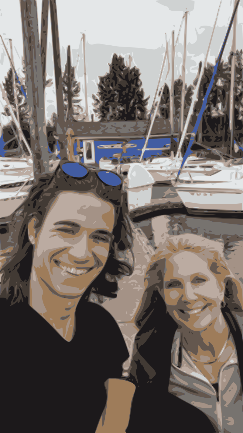 Photo of mother and son on dock of Island Sailing Club .