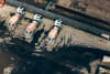 Overhead shot of cement trucks waiting