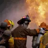 Firefighters putting out a fire