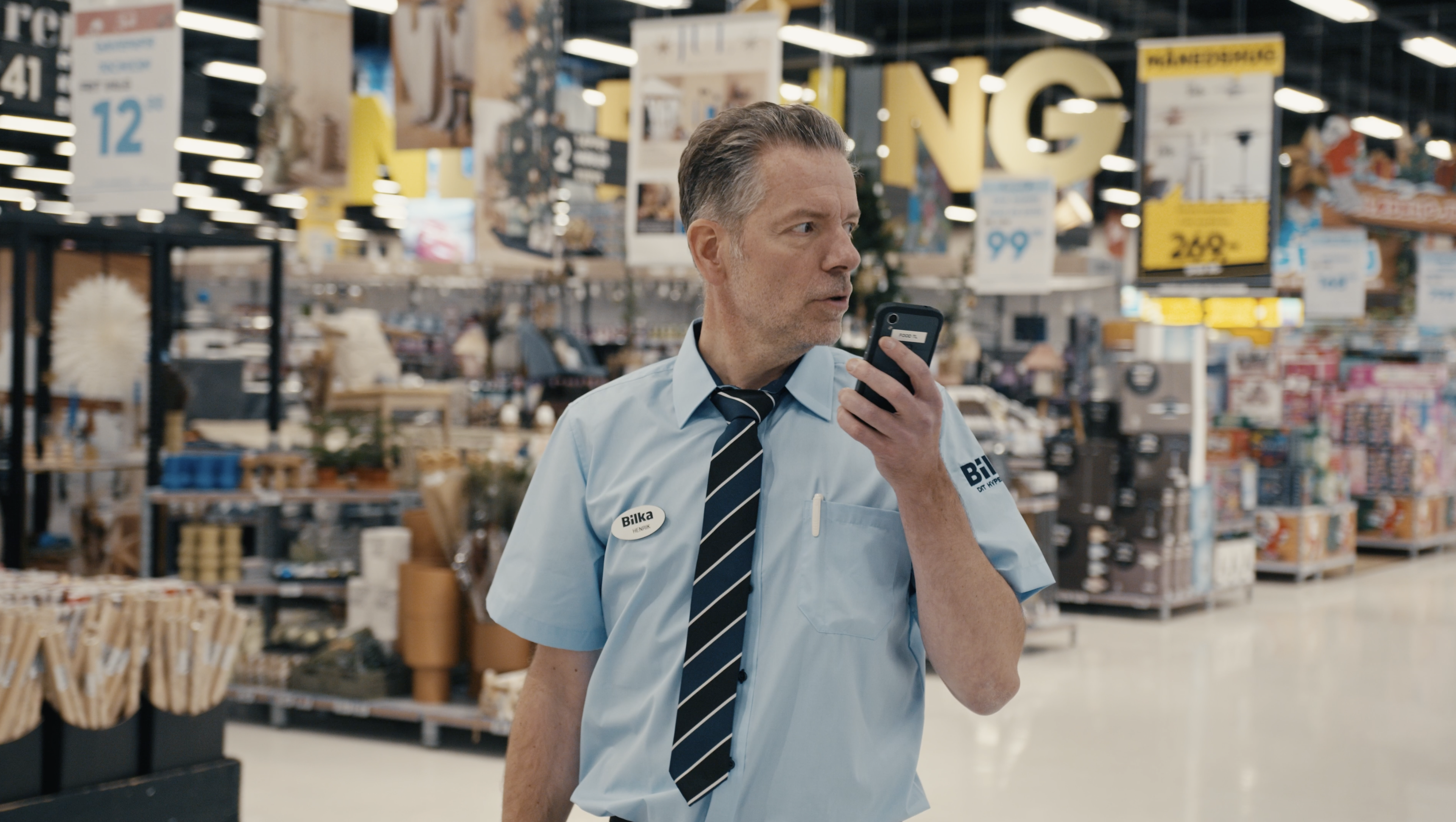 Photo of someone using Zello on a mobile device in a retail store