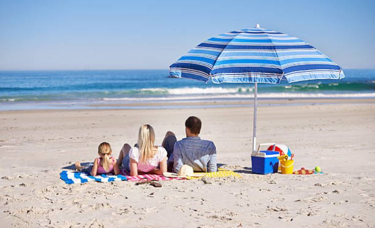 seaside under a beach umbrella