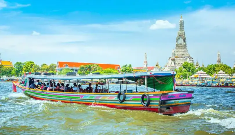 Best Places to Visit In Thailand, The bustling Chao Phraya River offers a long-tail boat excursion