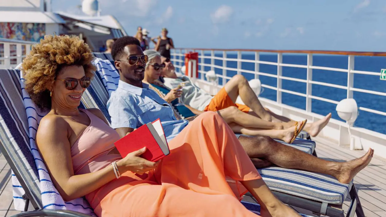 Couples in their 20s & 30s enjoying the Best Cruise Lines for Young Adults in the Caribbean