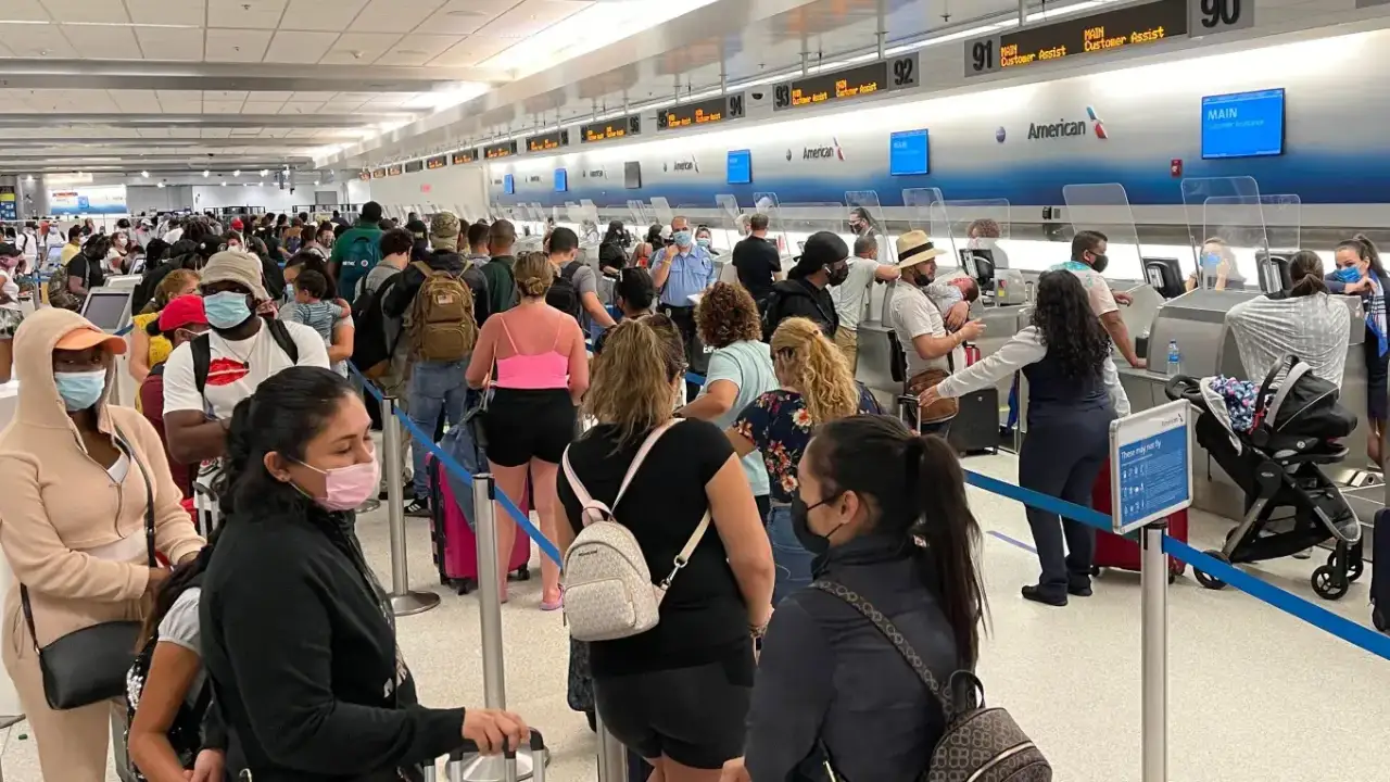 Passengers waiting in security line at Miami Airport