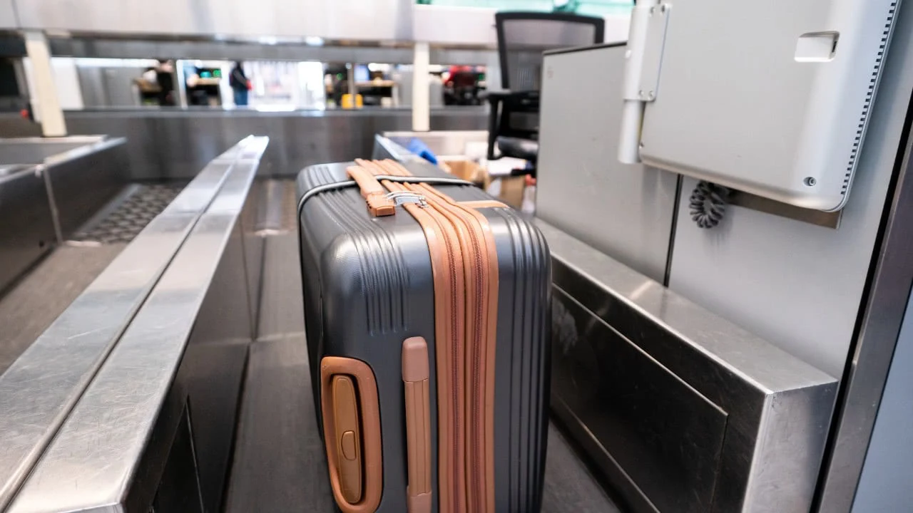 Automated baggage drop machine for WestJet check-in