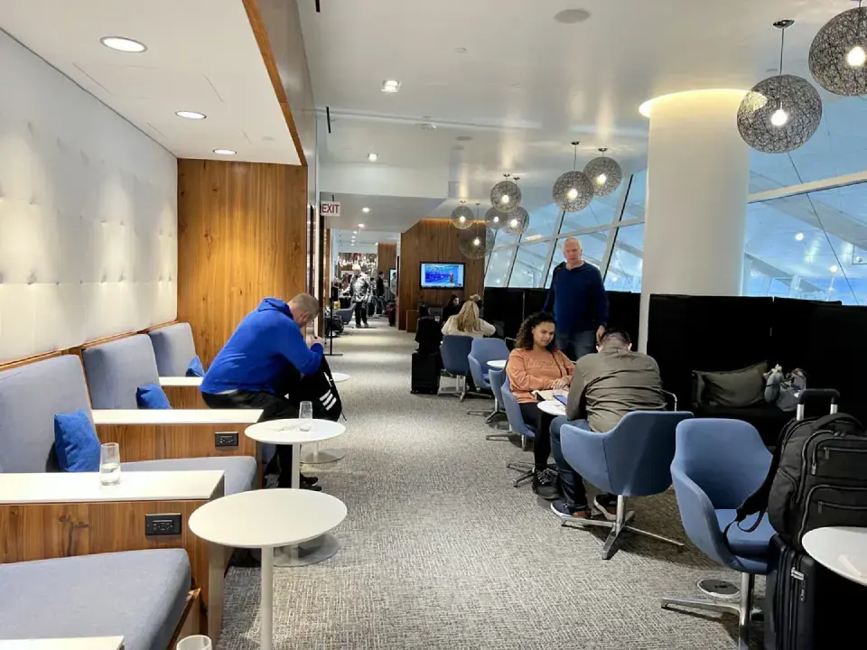 Travelers relaxing in airport lounge