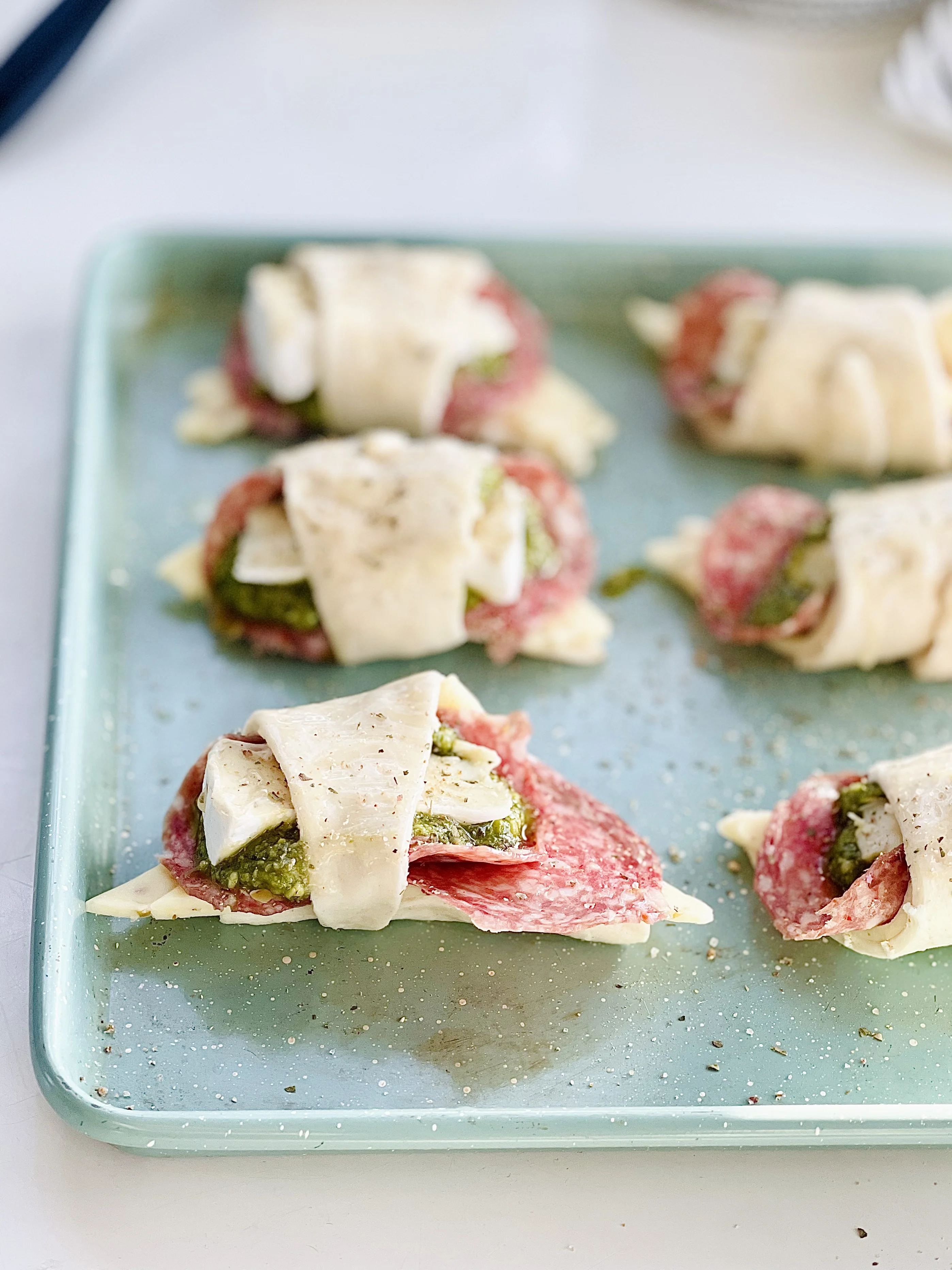 cheesy-pesto-brie-and-calabrese-pizza-rolls