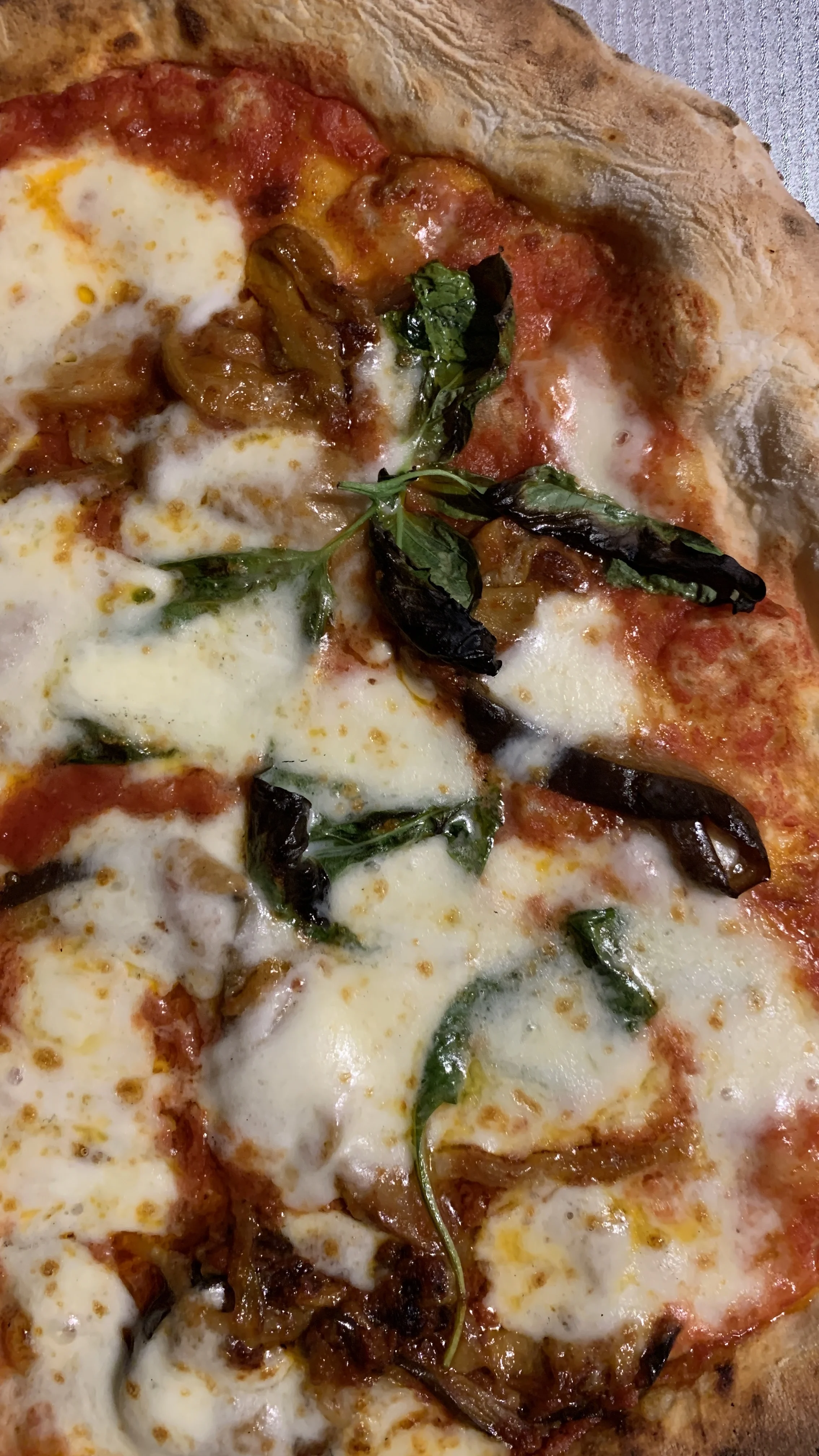 homemade-pizza-or-pinsa-with-tomato-mozzarella-and-eggplant