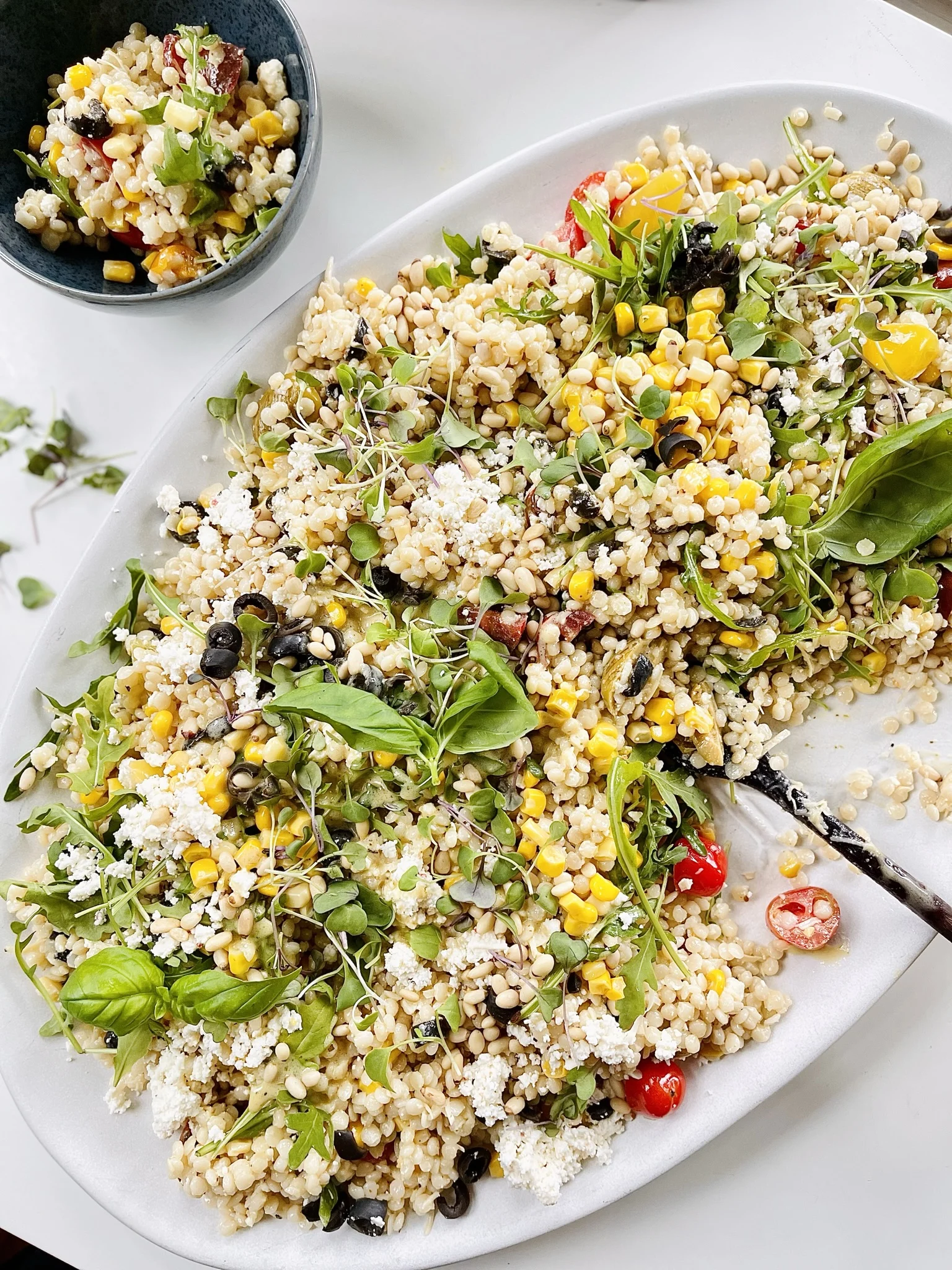 feta-and-corn-couscous-pasta-salad-with-arugula-and-grilled-green-olives