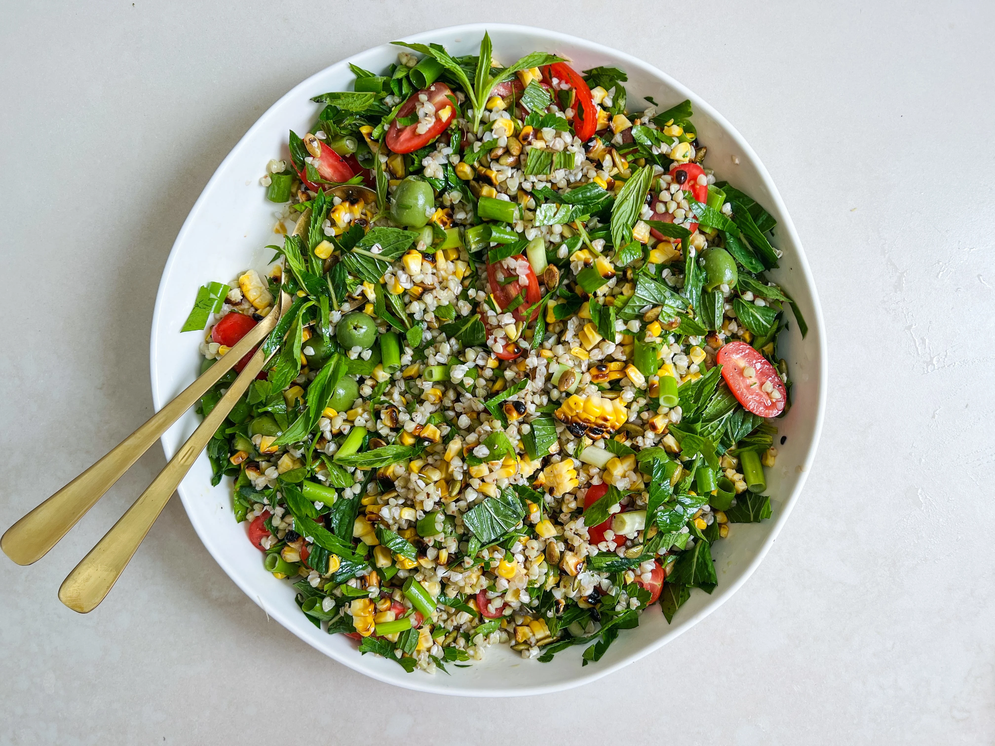 charred-corn-buckwheat-tomato-and-green-olive-salad