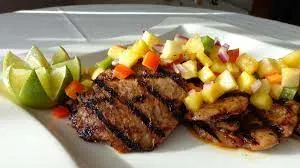 jerk-pork-tenderloin-with-pineapple-plum-relish