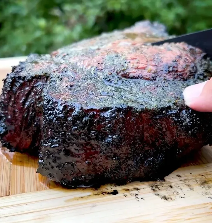 campfire-tomahawk-steak-with-garlic-butter