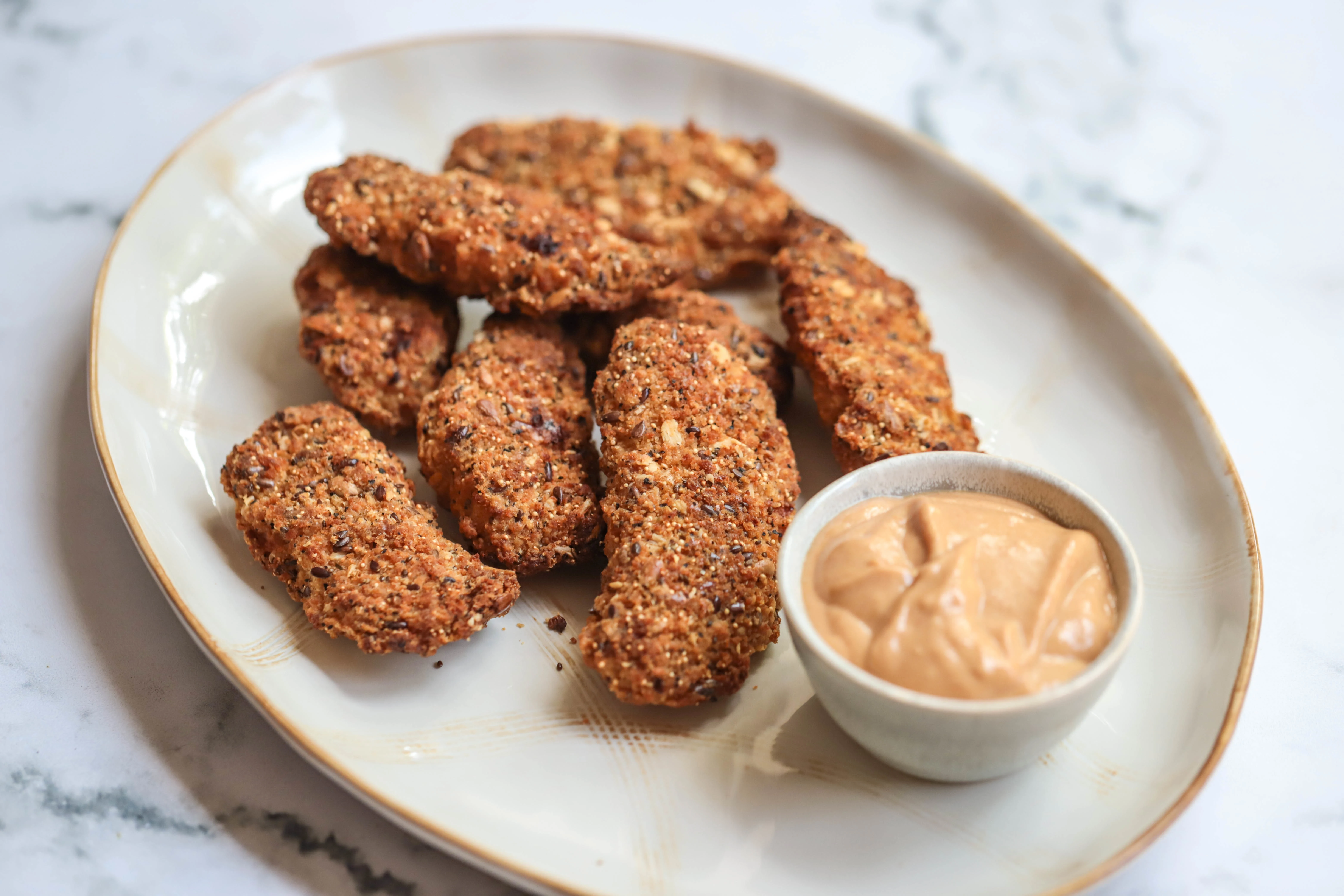sesame-coconut-chicken-nuggets-with-peanut-sauce