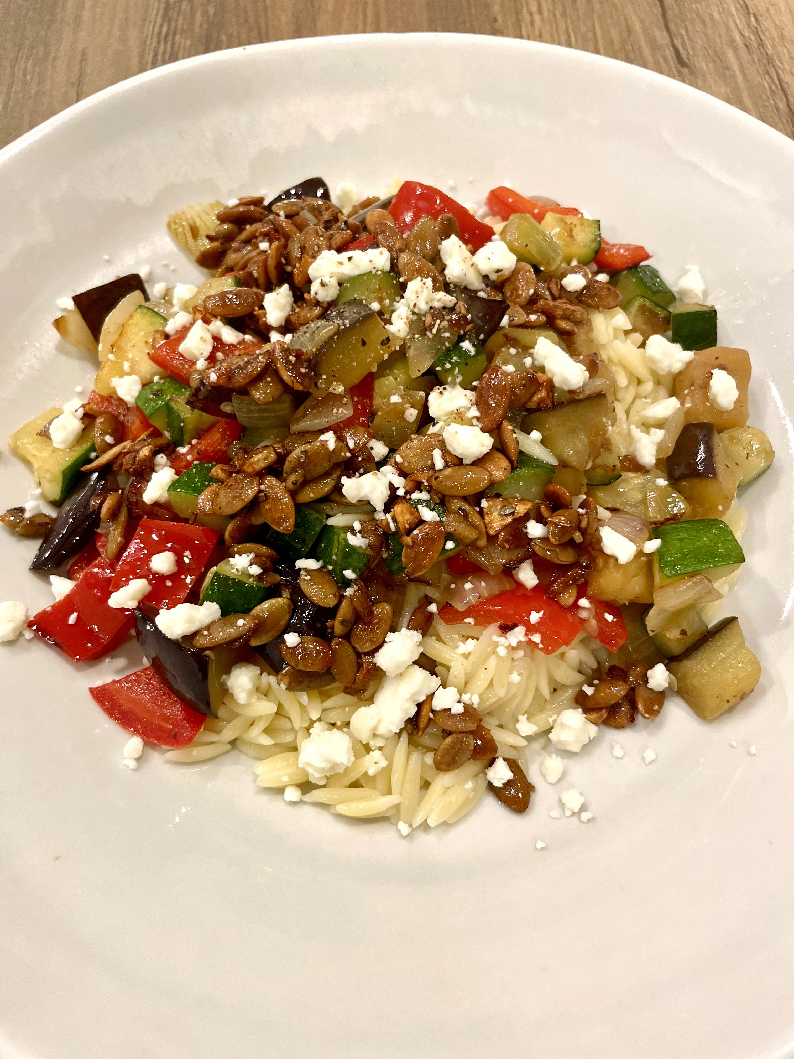 orzo-salad-with-roasted-veggies-and-warm-pumpkin-seed-and-garlic-vinaigrette