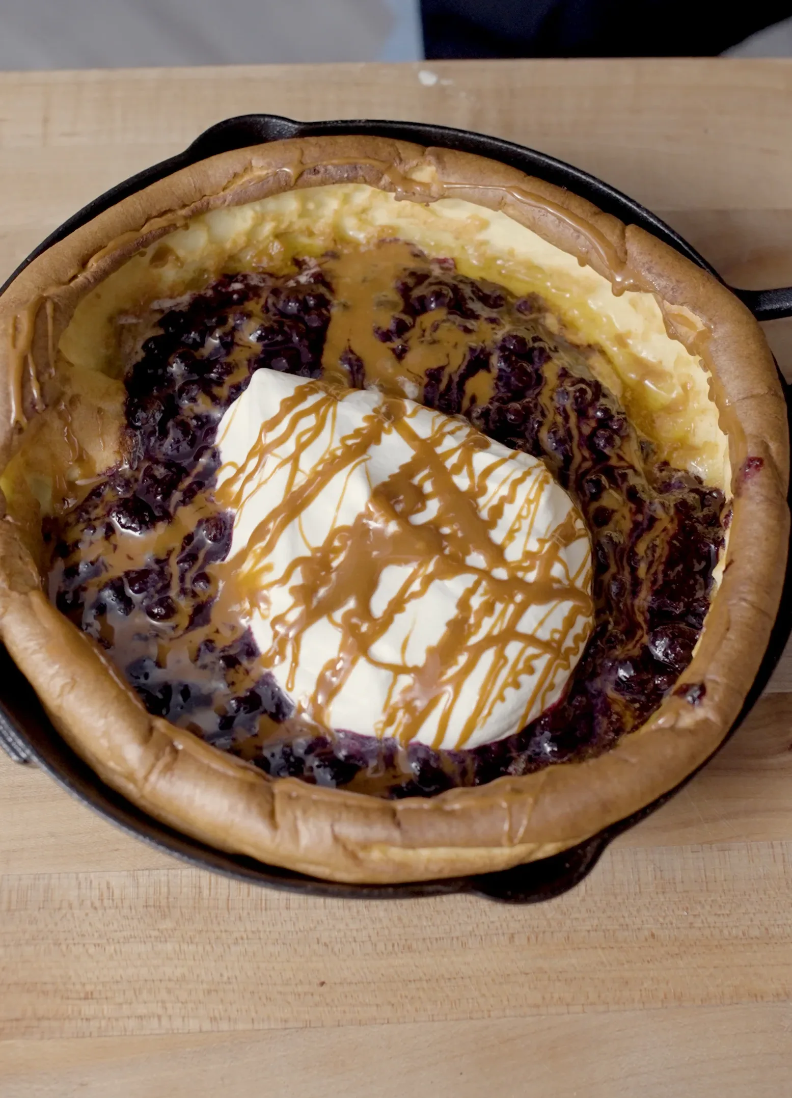 dutch-baby-with-cajeta-blueberry-sumac-compote
