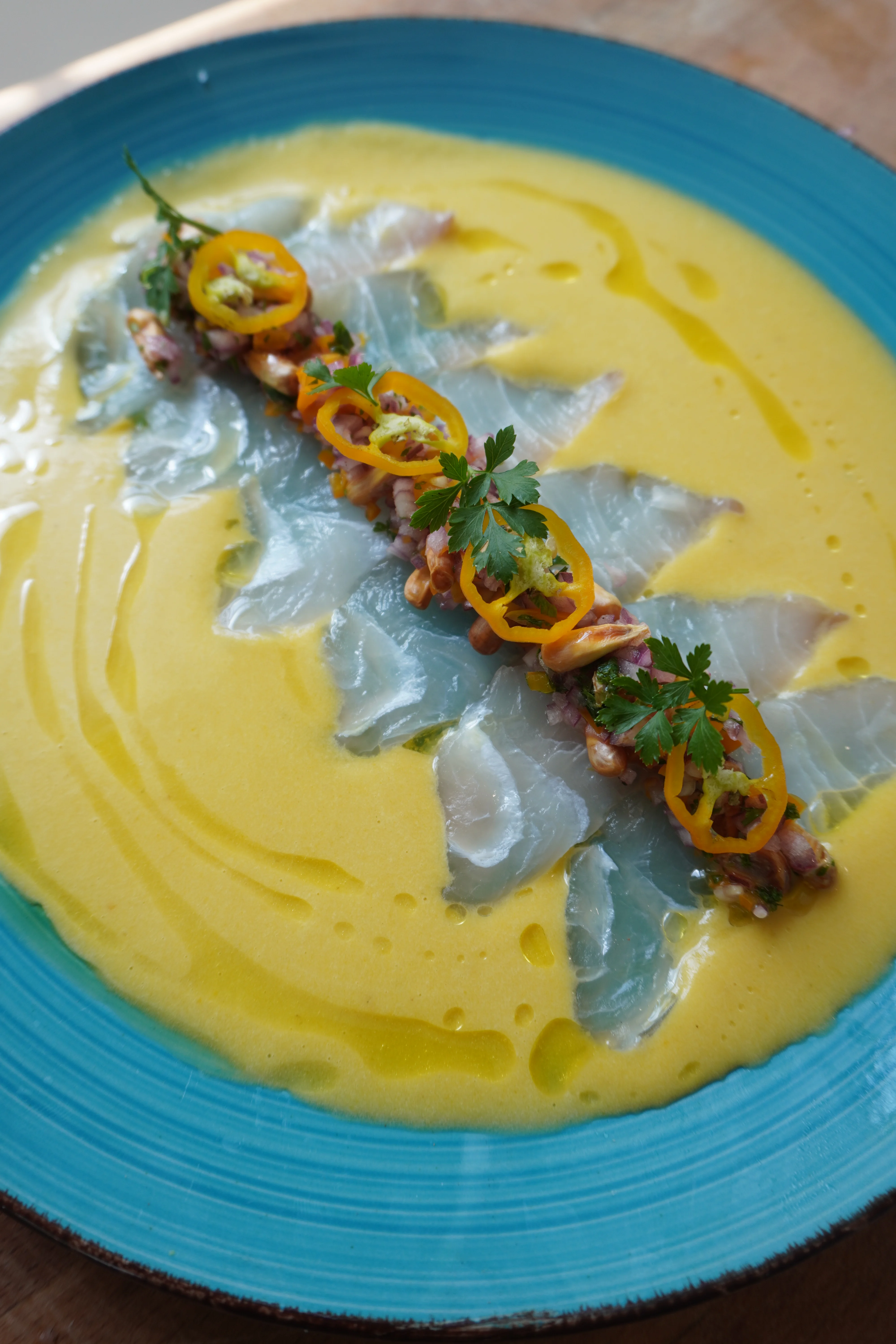 tiradito-con-leche-de-tigre-confitada-de-aji-amarillo-tiradito-with-confit-tiger's-milk-of-yellow-chili-pepper
