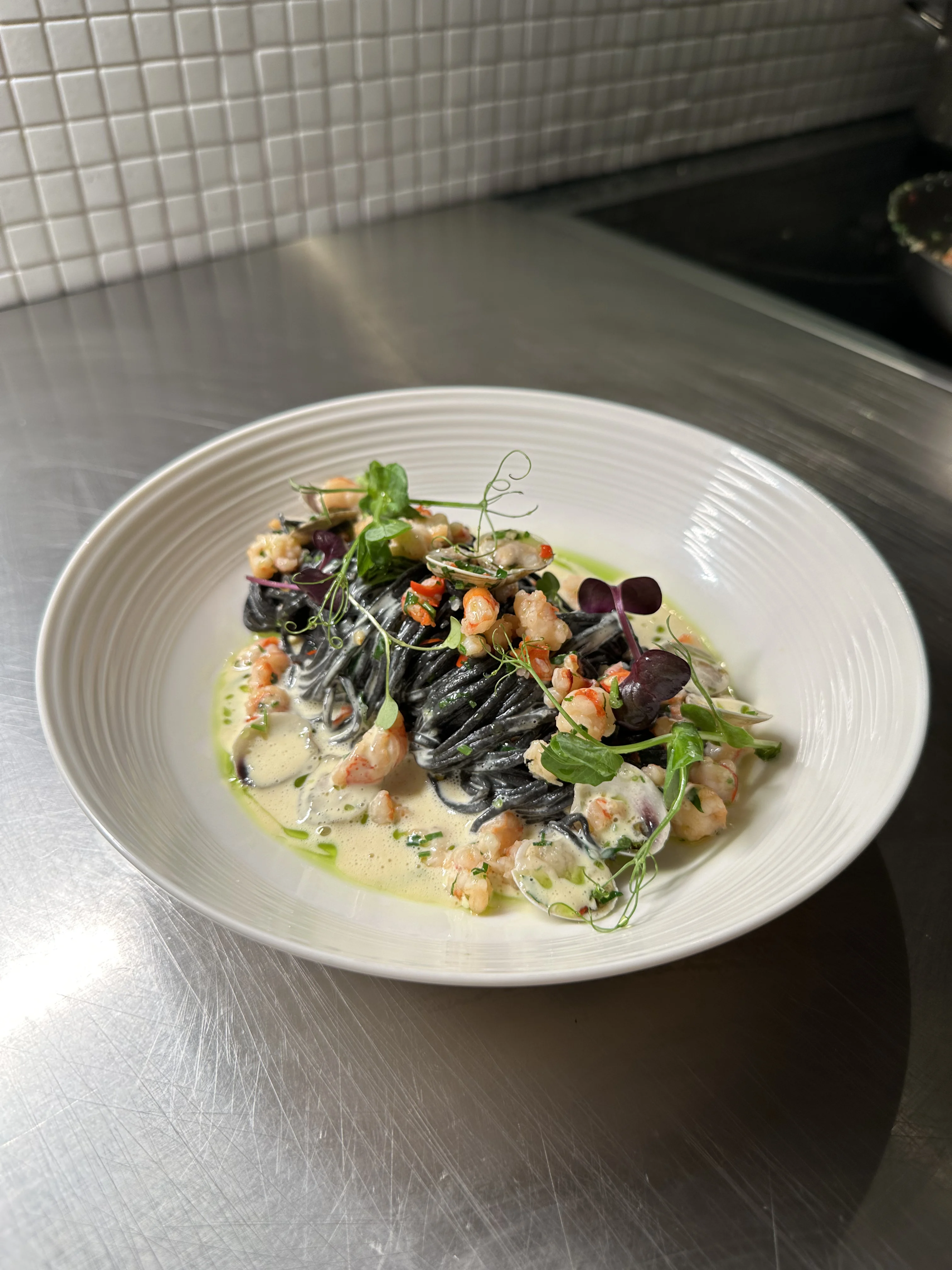 squid-ink-pasta-with-prawns-chilies-and-vongolo-clam-voulette