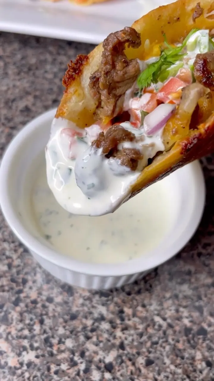 cheesy-steak-tacos-with-cilantro-lime-sauce