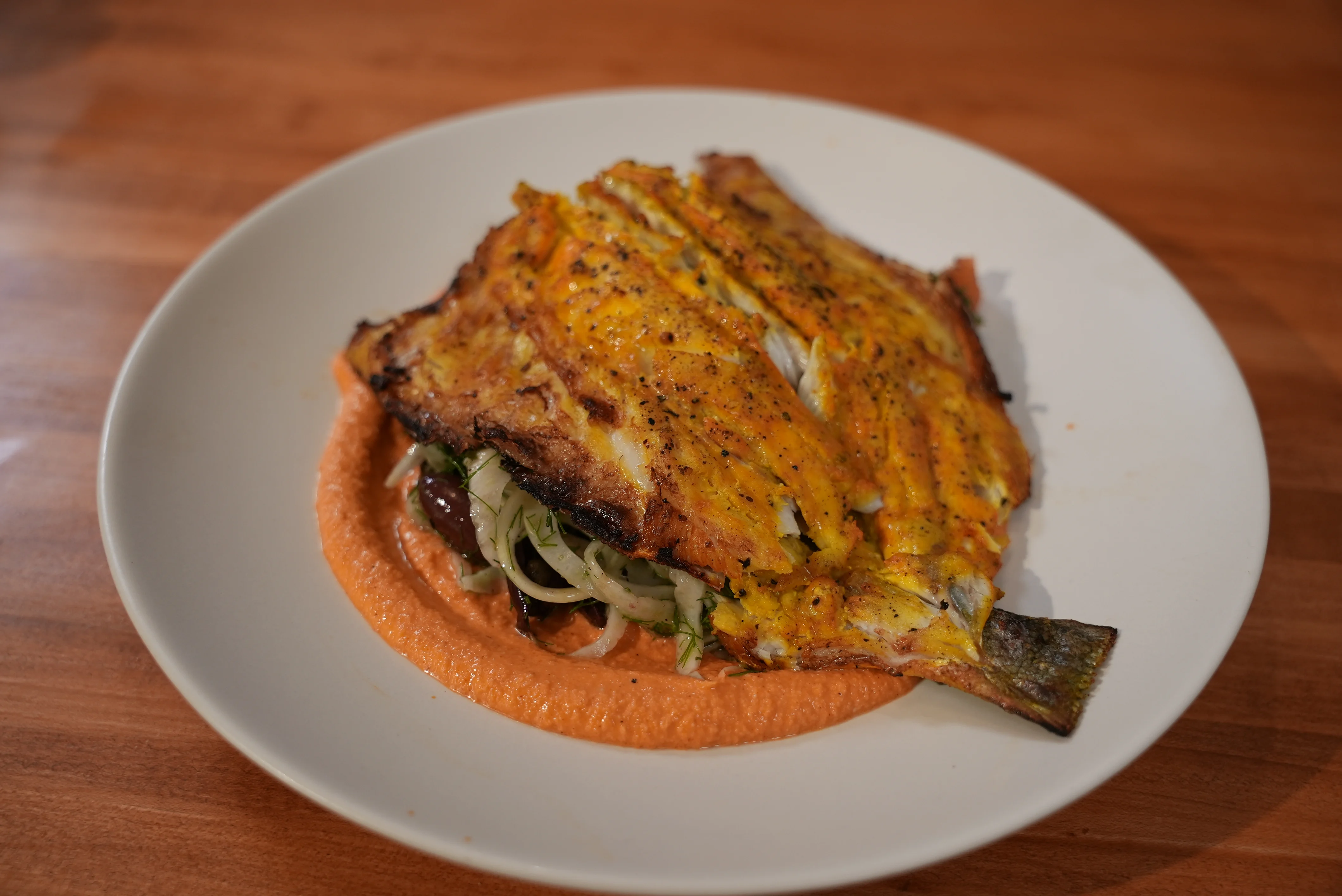 saffron-marinated-bronzino-with-romesco-and-fennel-citrus-salad