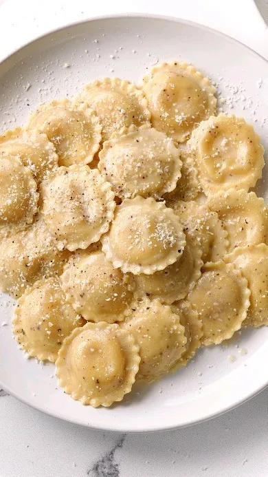 cacio-e-pepe-ravioli-with-cacio-e-pepe-sauce