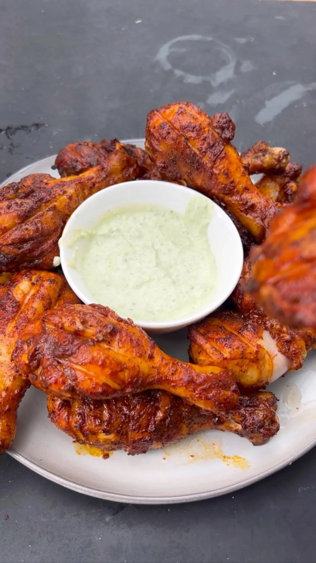 achiote-marinated-rotisserie-chicken-drumsticks-with-a-jalapeno-lime-crema