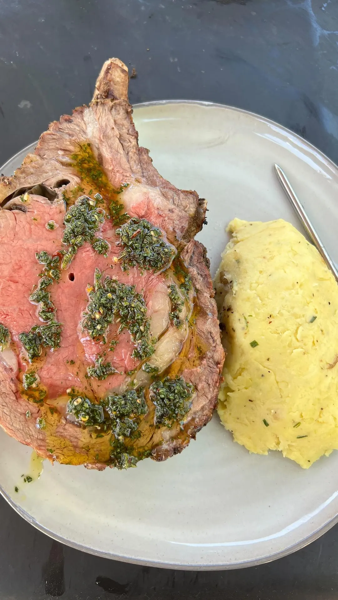 open-fire-rotisserie-prime-ribs-with-cheesy-garlic-mashed-potatoes