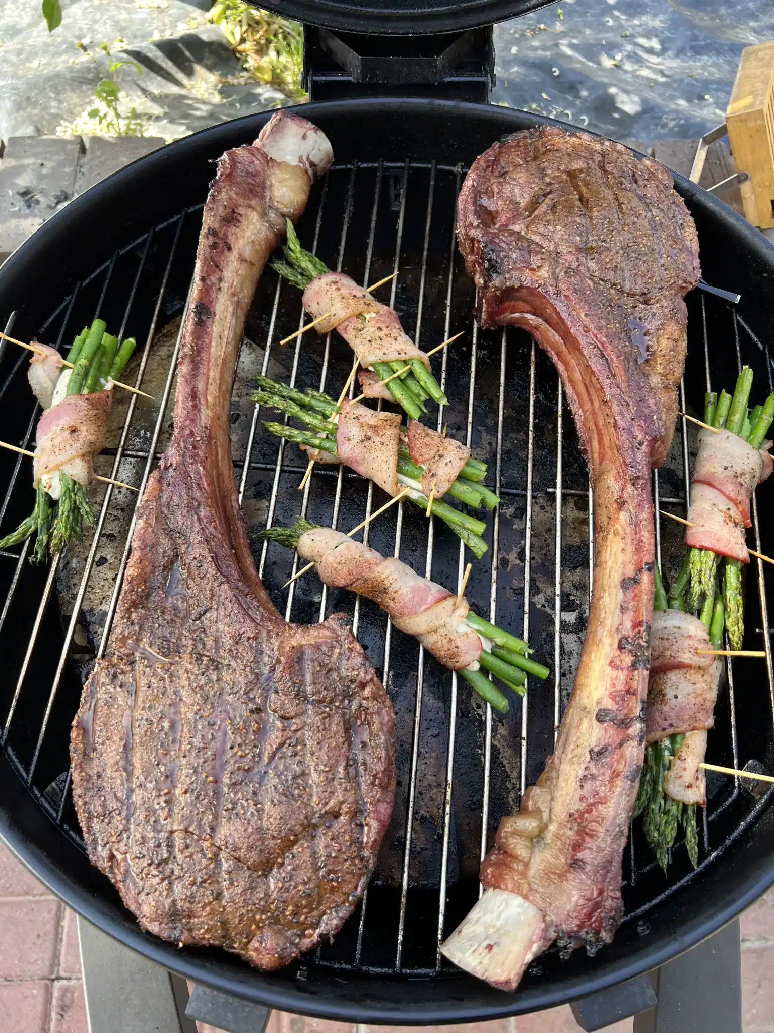 reverse-seared-tomahawk-steaks-with-bacon-wrapped-crema-cheese-asparagus