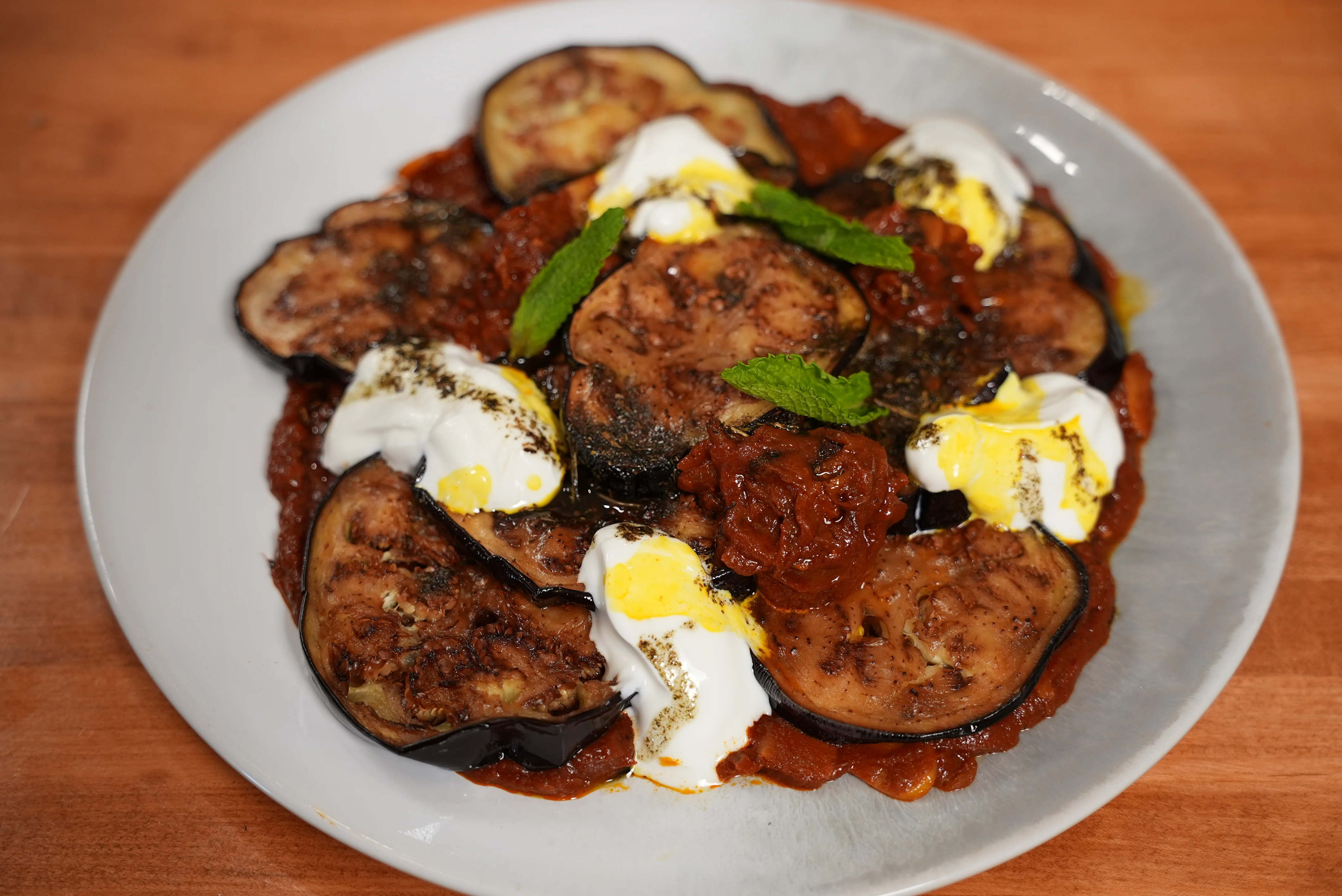 eggplant-with-saffron-tomato-sauce-and-mint-oil
