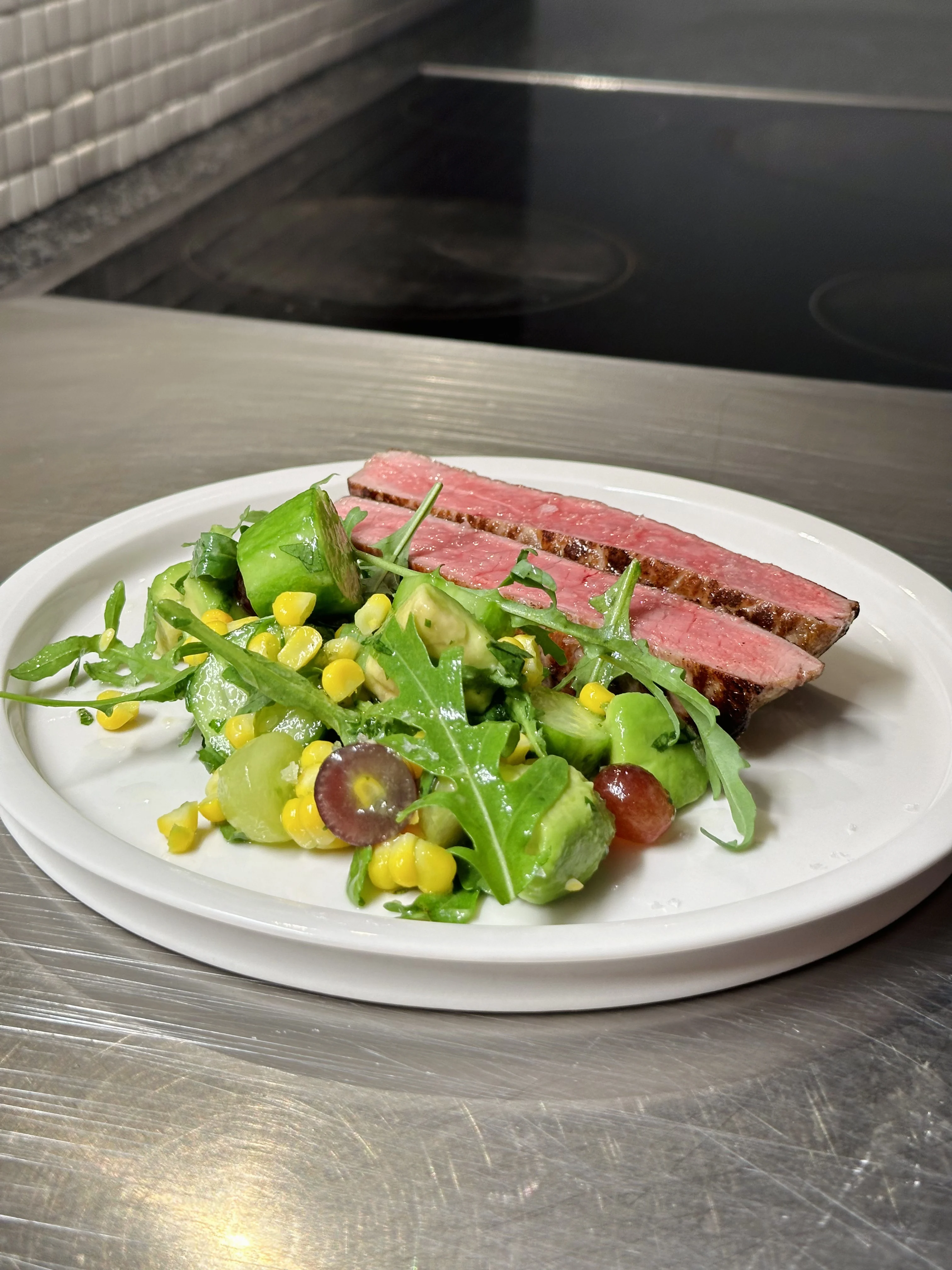 vibrant-nutrient-packed-salad-(avocado-grapes-cucumber-fresh-corn-etc.)