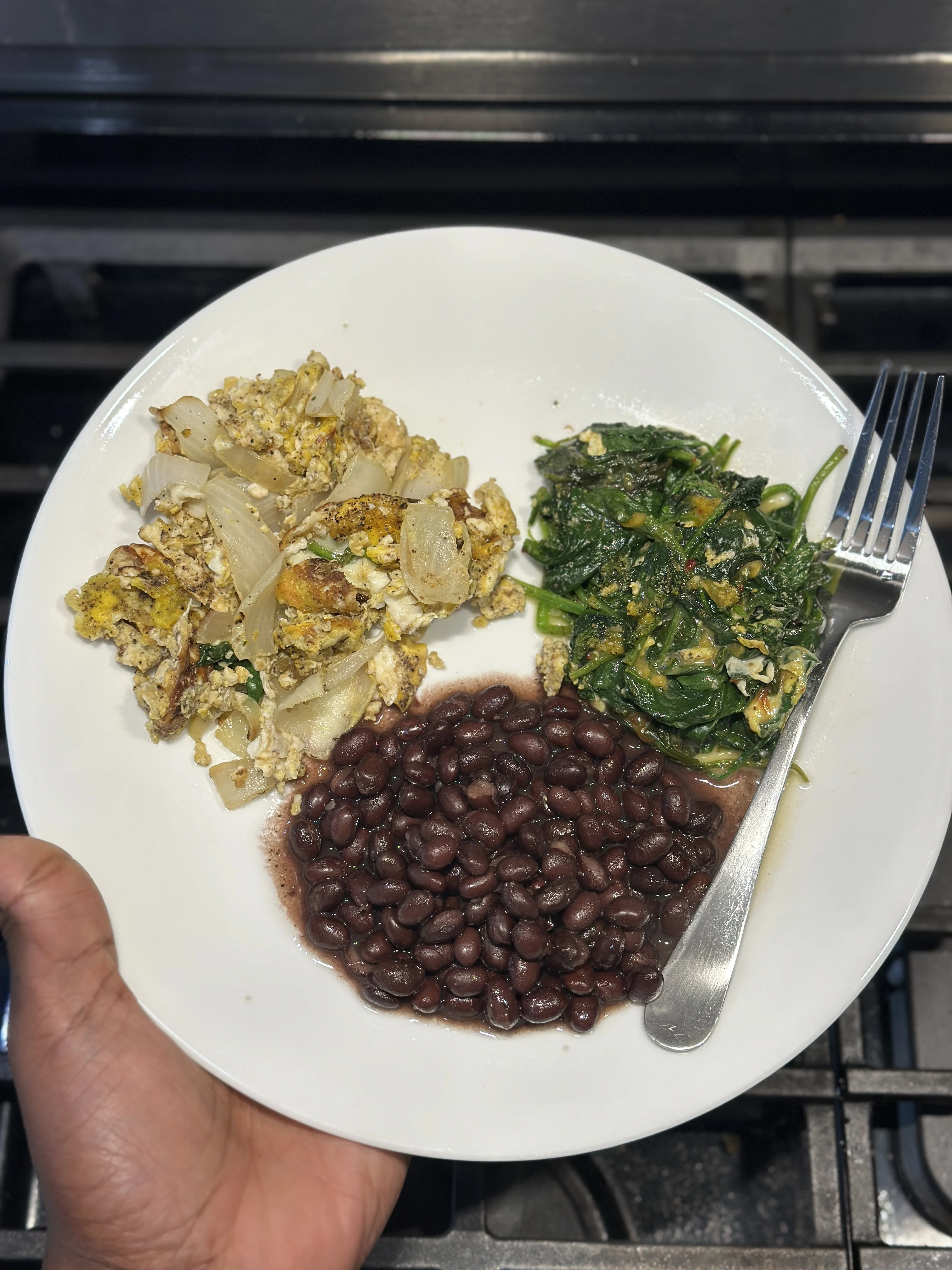 scrambled-eggs-with-sauteed-onions-cheesy-sauteed-spinach-and-black-beans