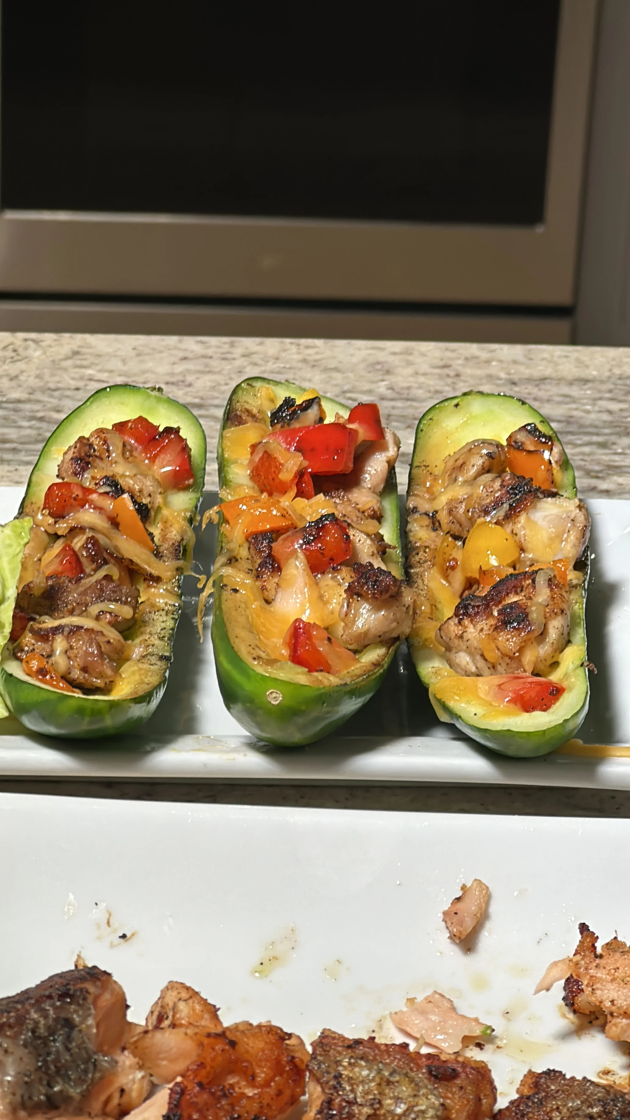 cucumber-stuffed-boats-with-chicken-and-bell-peppers