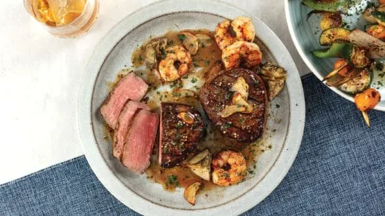 filet-mignon-with-whiskey-glazed-shrimp-and-bacon-and-parmesan-au-gratin-potatoes