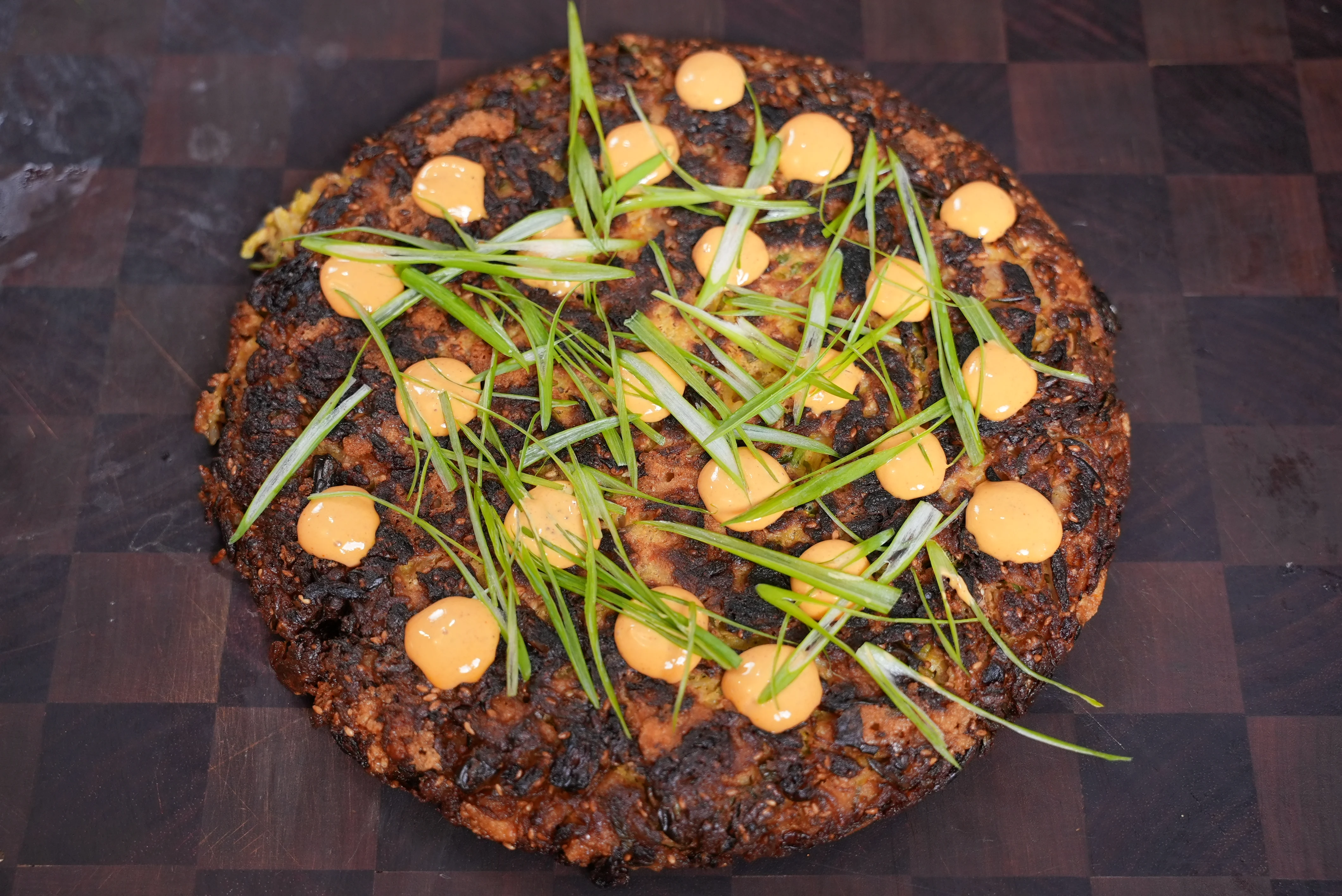 crispy-kimchi-and-gruyere-rice-fritter-with-gochujang-crema-and-scallion-slaw