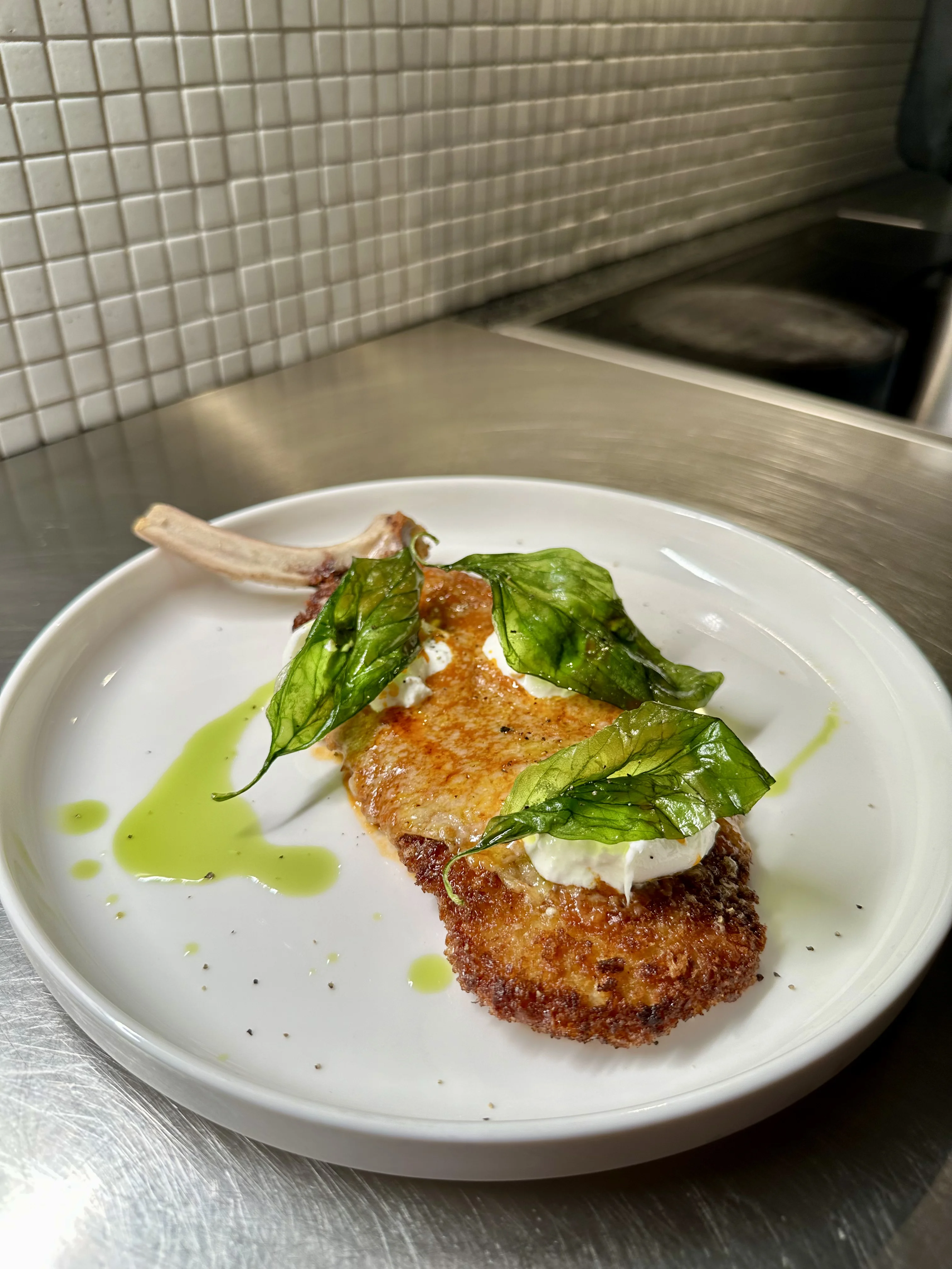 veal-parmigiana-with-cherry-tomato-reduction-burrata-and-fried-basil