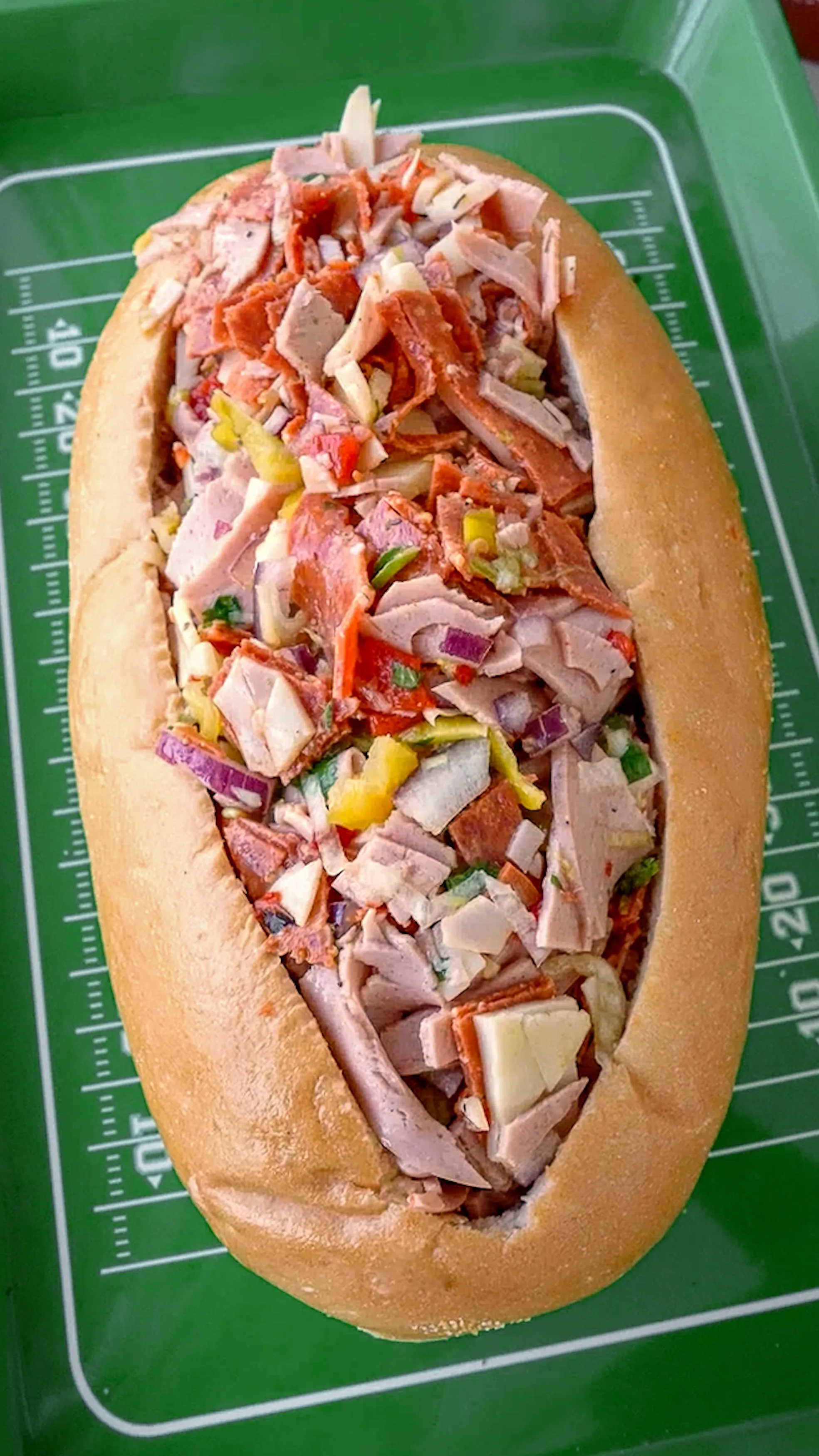 italian-chopped-sandwich-in-a-football-shaped-bread-bowl