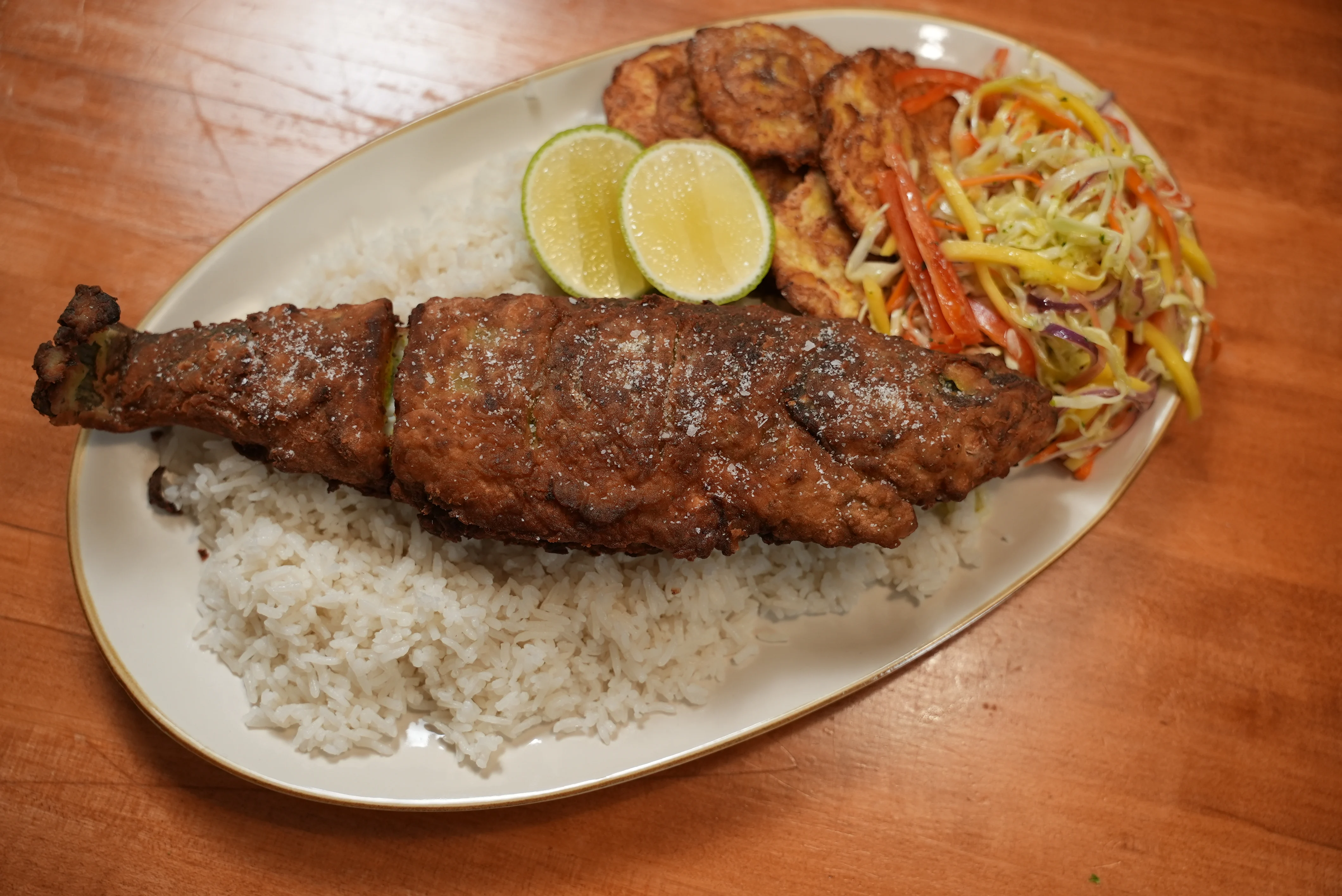 fried-whole-branzino-with-mango-slaw-tostones-and-coconut-rice