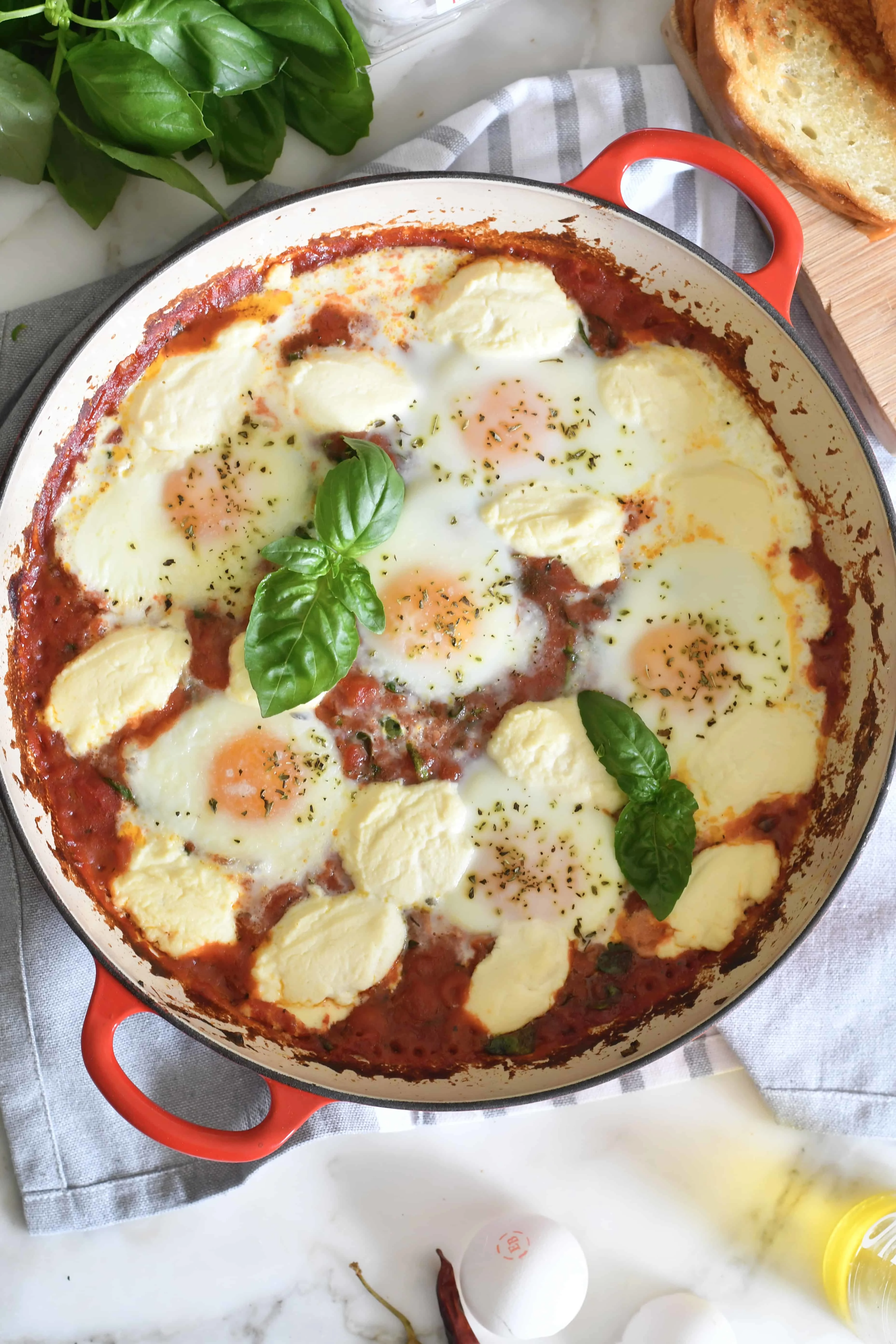baked-eggs-with-ricotta-spinach-and-tomato-sauce