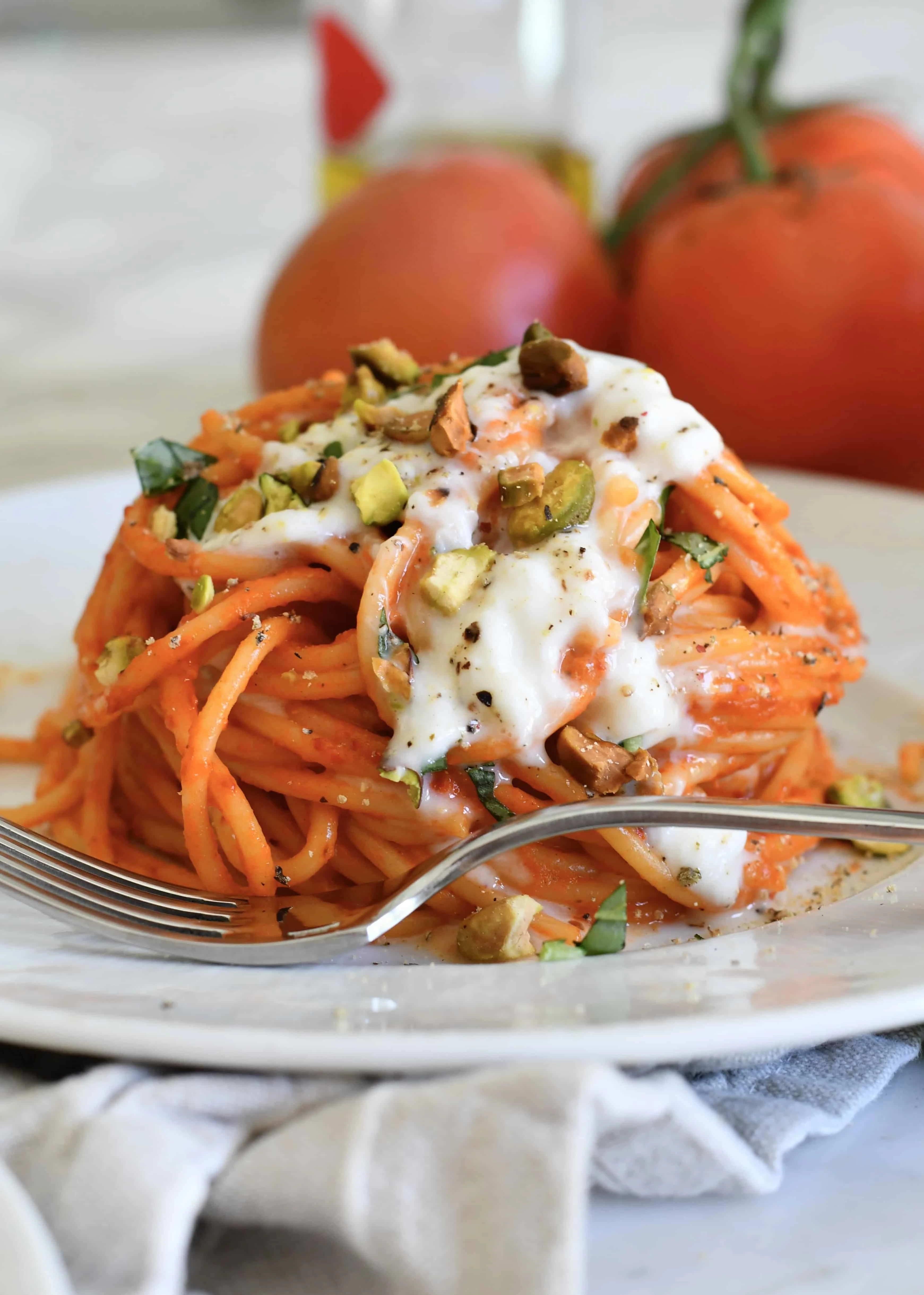 spaghetti-with-creamy-red-pepper-and-tomato-sauce-burrata-and-pistachios