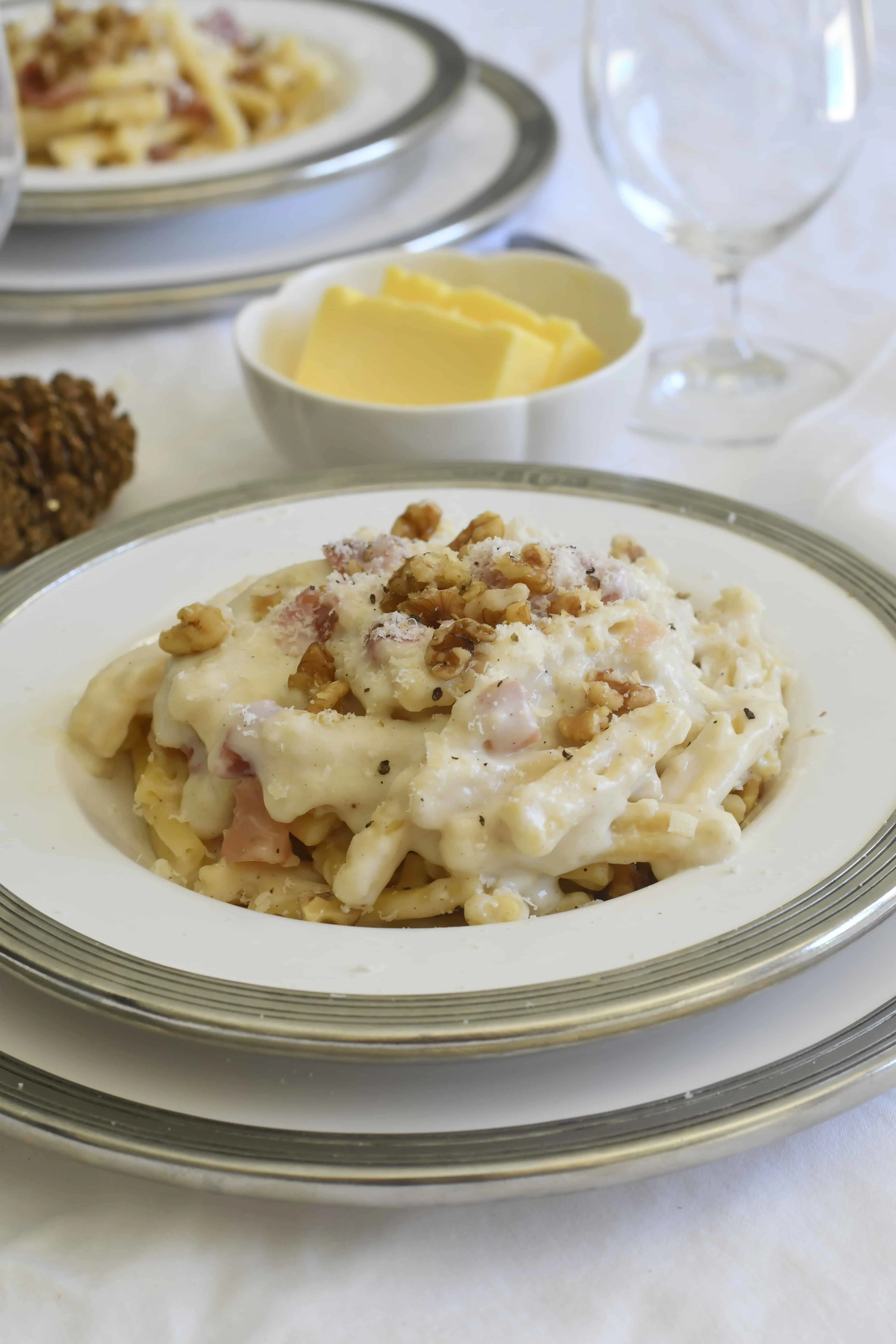 easy-and-delicious-pasta-with-bechamel-sauce-italian-speck-and-walnuts