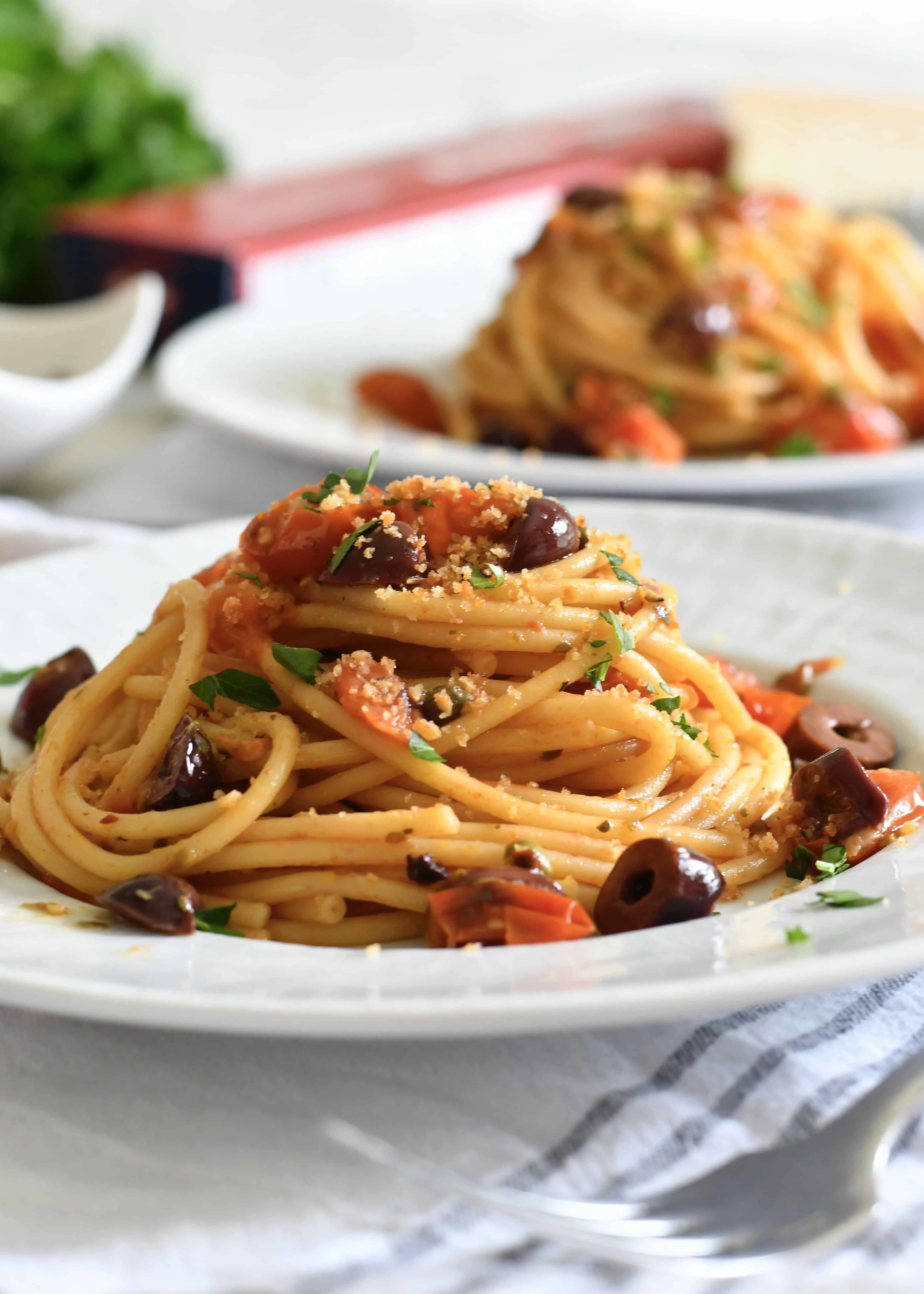 bucatini-pasta-with-fresh-tomatoes-olives-and-capers
