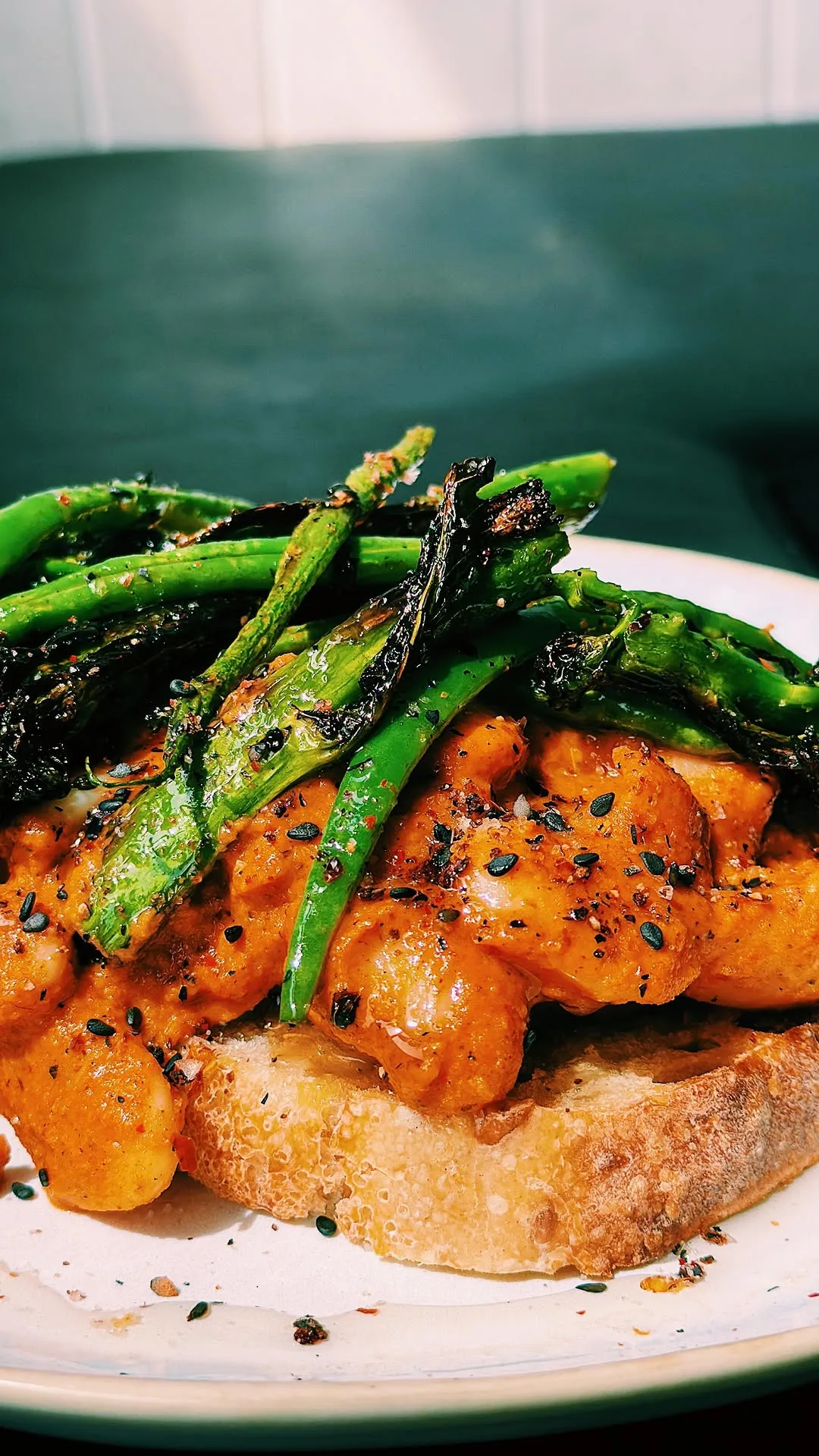 romesco-butter-beans-with-burnt-broccoli-and-broad-beans