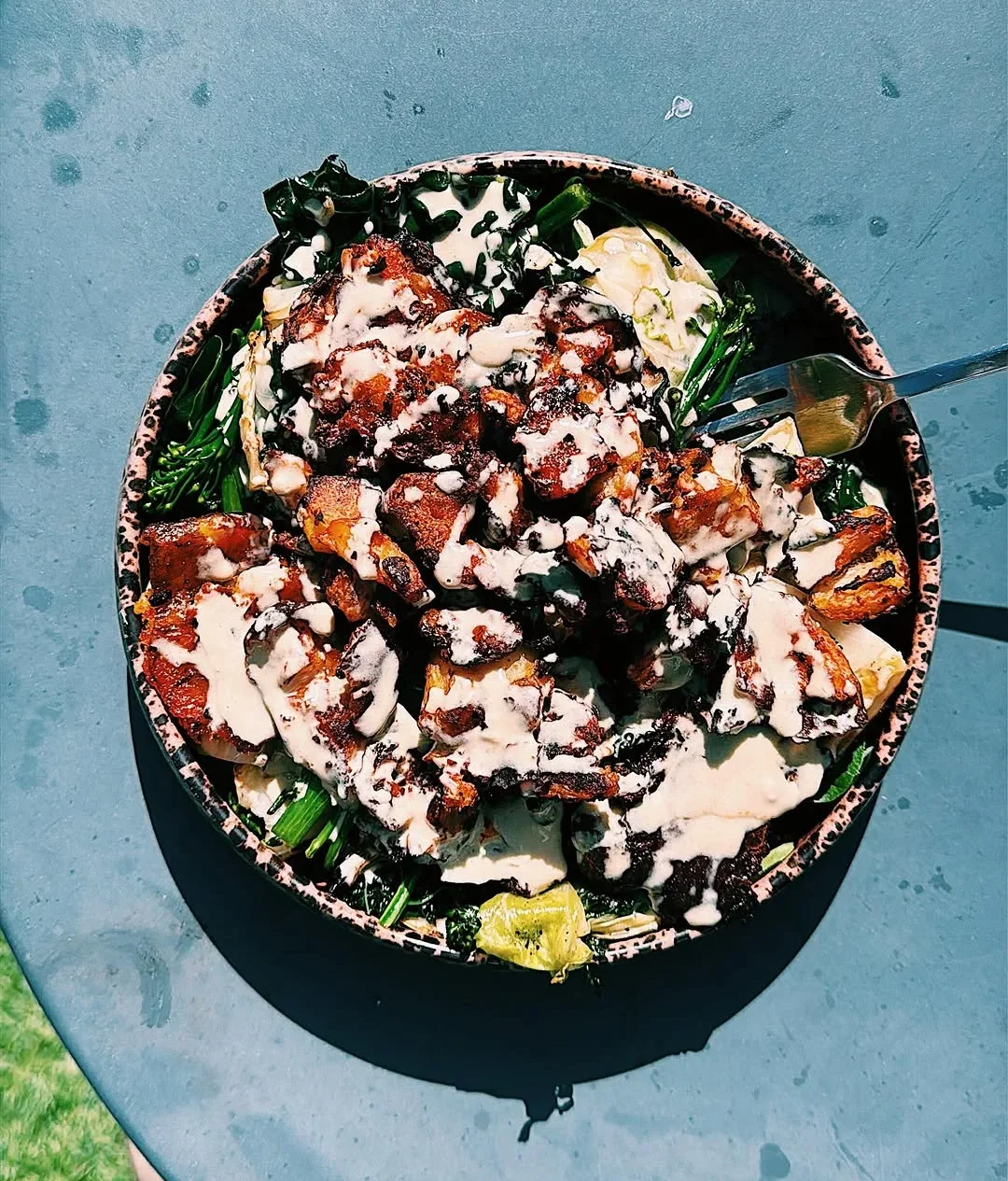 crispy-smashed-harissa-jersey-royals-with-a-charred-cabbage-salad