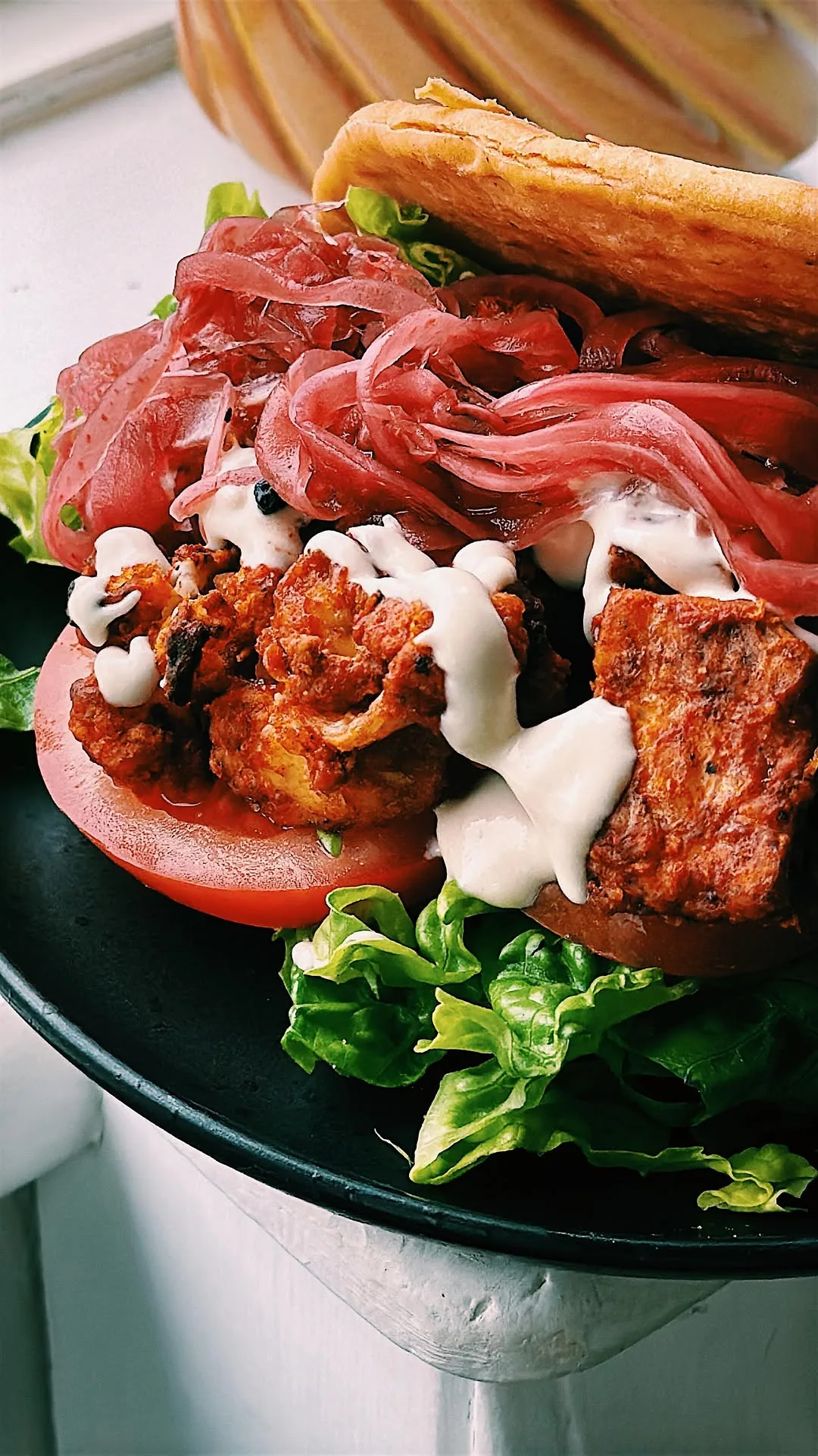 smoky-tomato-crispy-cauliflower-and-tofu-pita-pocket