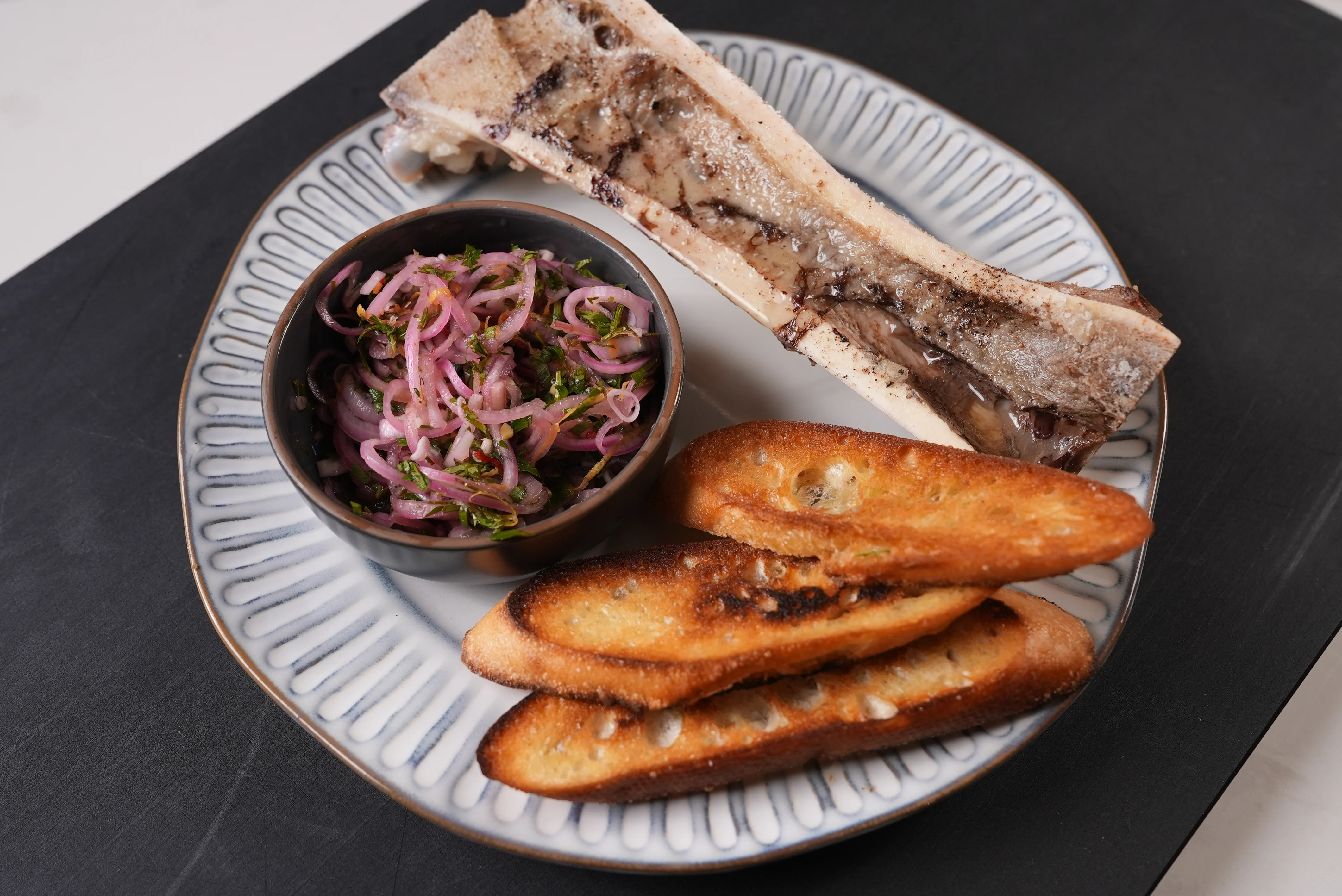 roasted-bone-marrow-with-calabrian-chili-pickled-shallots