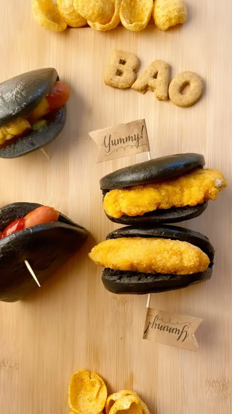 steamed-black-bao-buns-with-cocktail-sausages-and-crispy-chicken