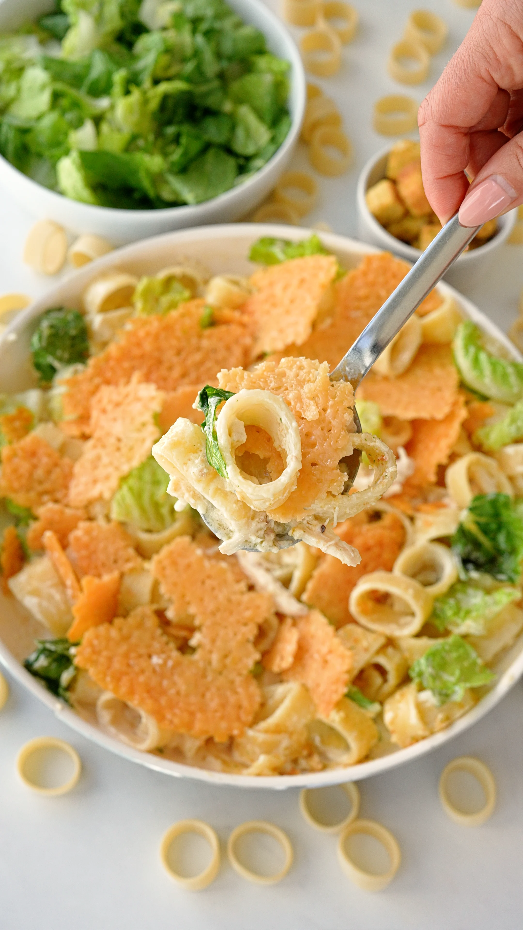 warm-caesar-salad-pasta-with-a-crispy-parmesan-top